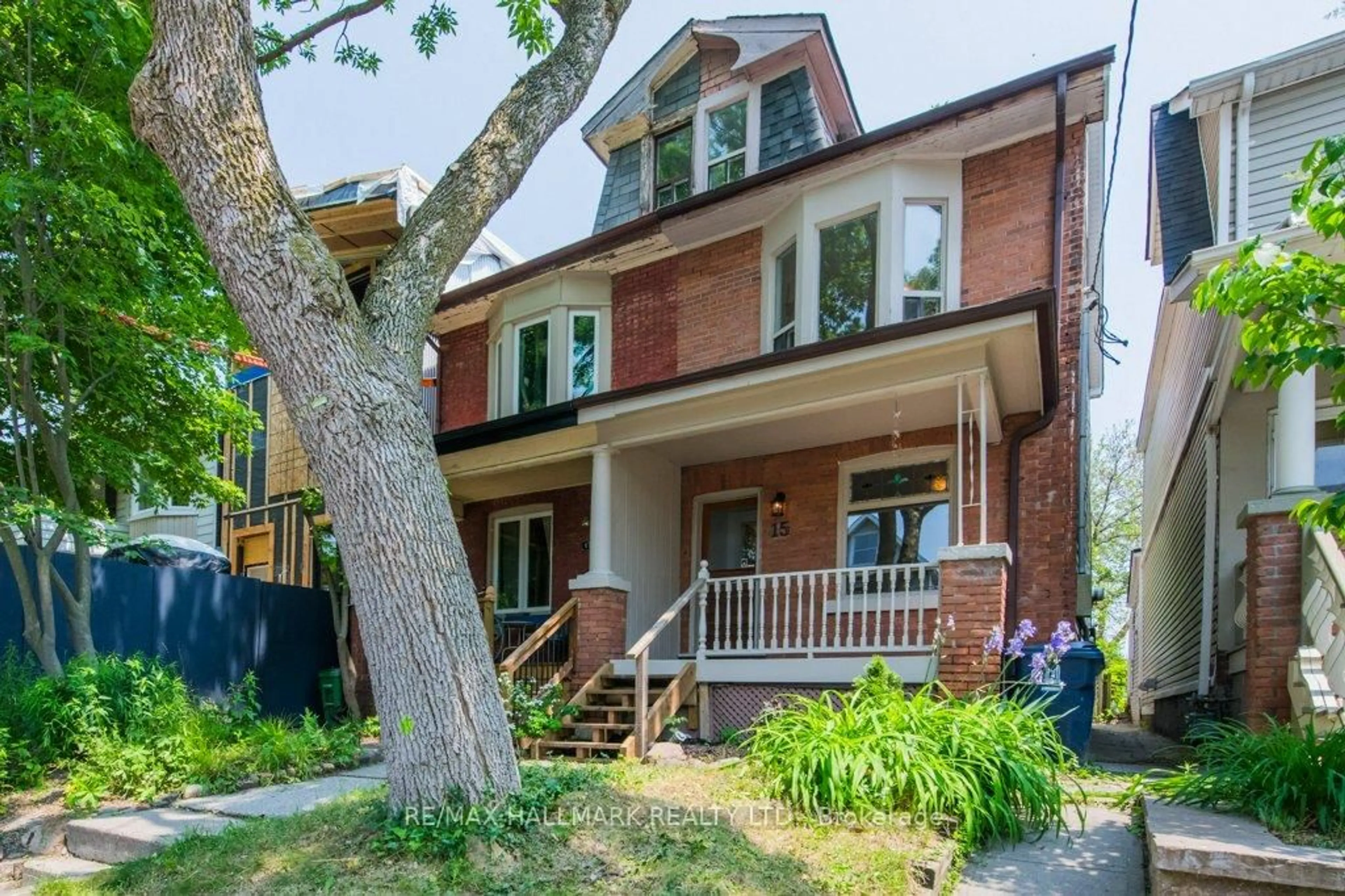 Home with brick exterior material, street for 15 Seymour Ave, Toronto Ontario M4J 3T3