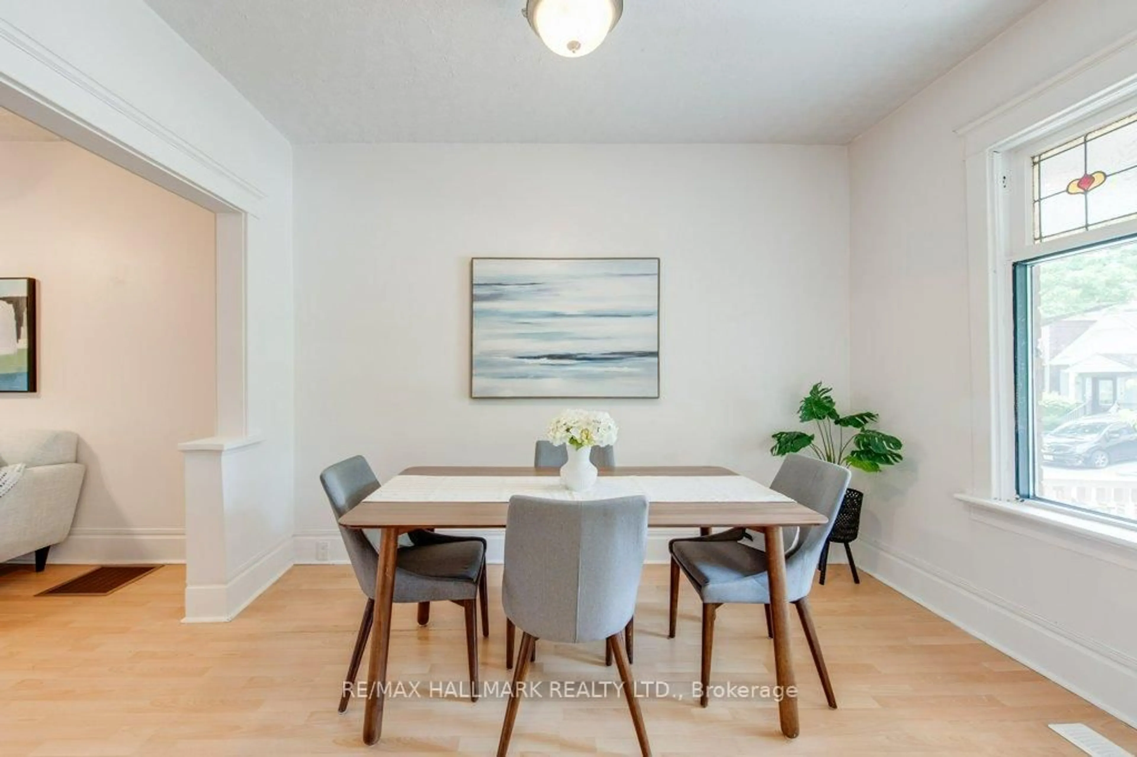Dining room, wood/laminate floor for 15 Seymour Ave, Toronto Ontario M4J 3T3
