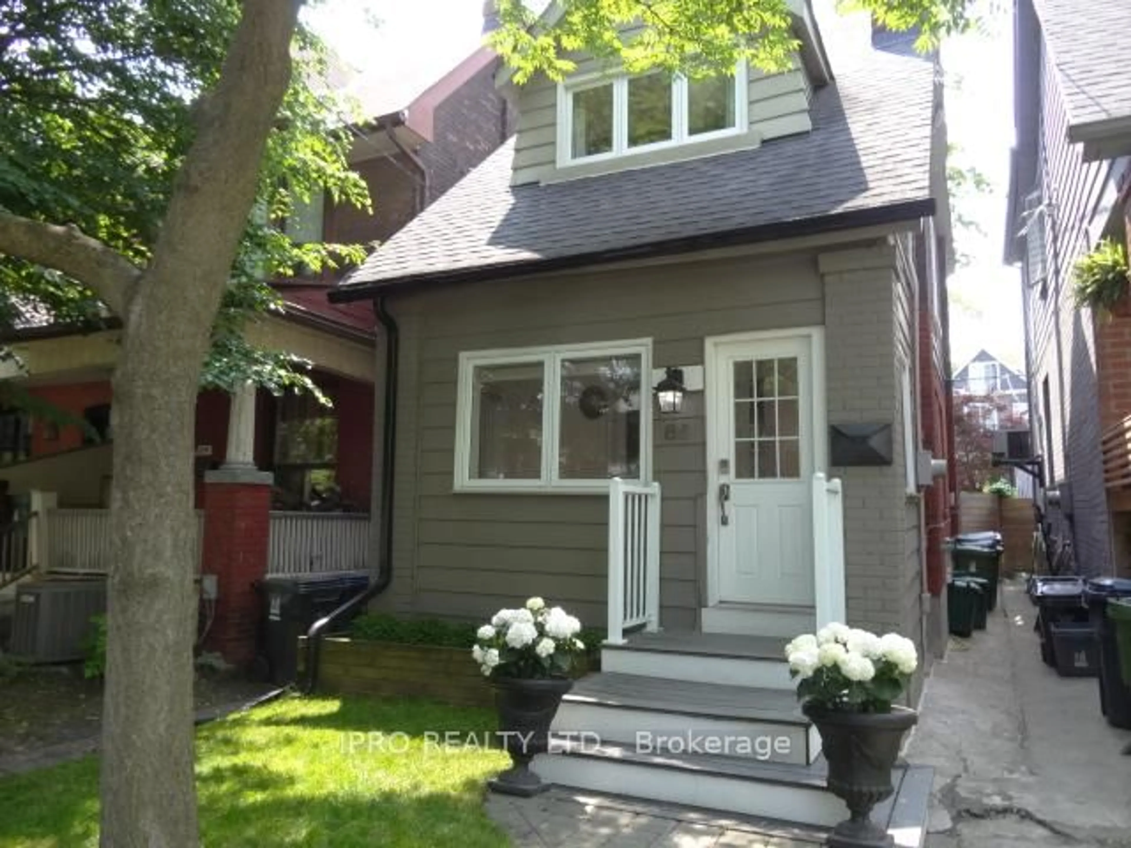 Home with vinyl exterior material, street for 86 Bertmount Ave, Toronto Ontario M4M 2X9