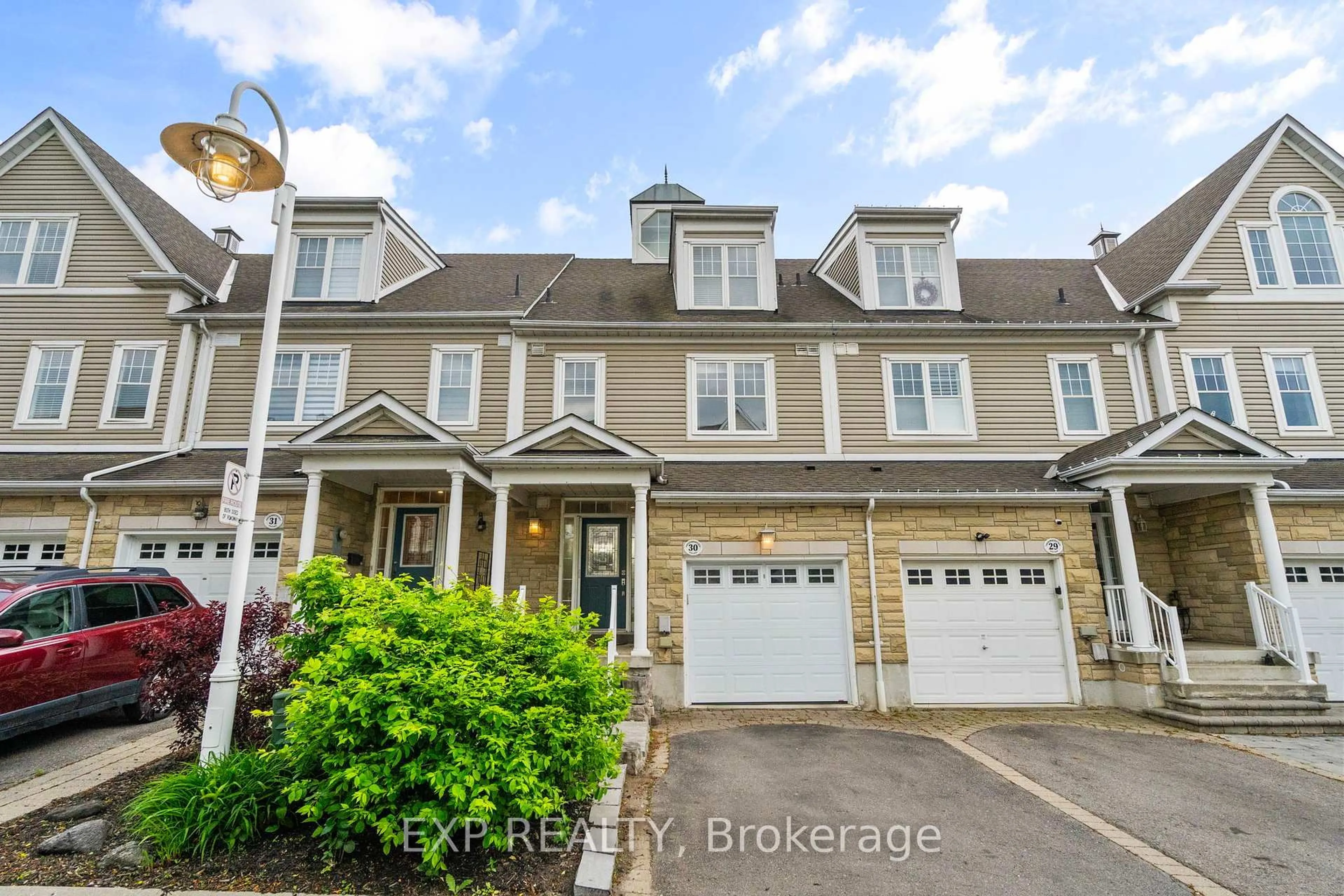 A pic from outside/outdoor area/front of a property/back of a property/a pic from drone, street for 1295 Wharf St #30, Pickering Ontario L1W 1A2