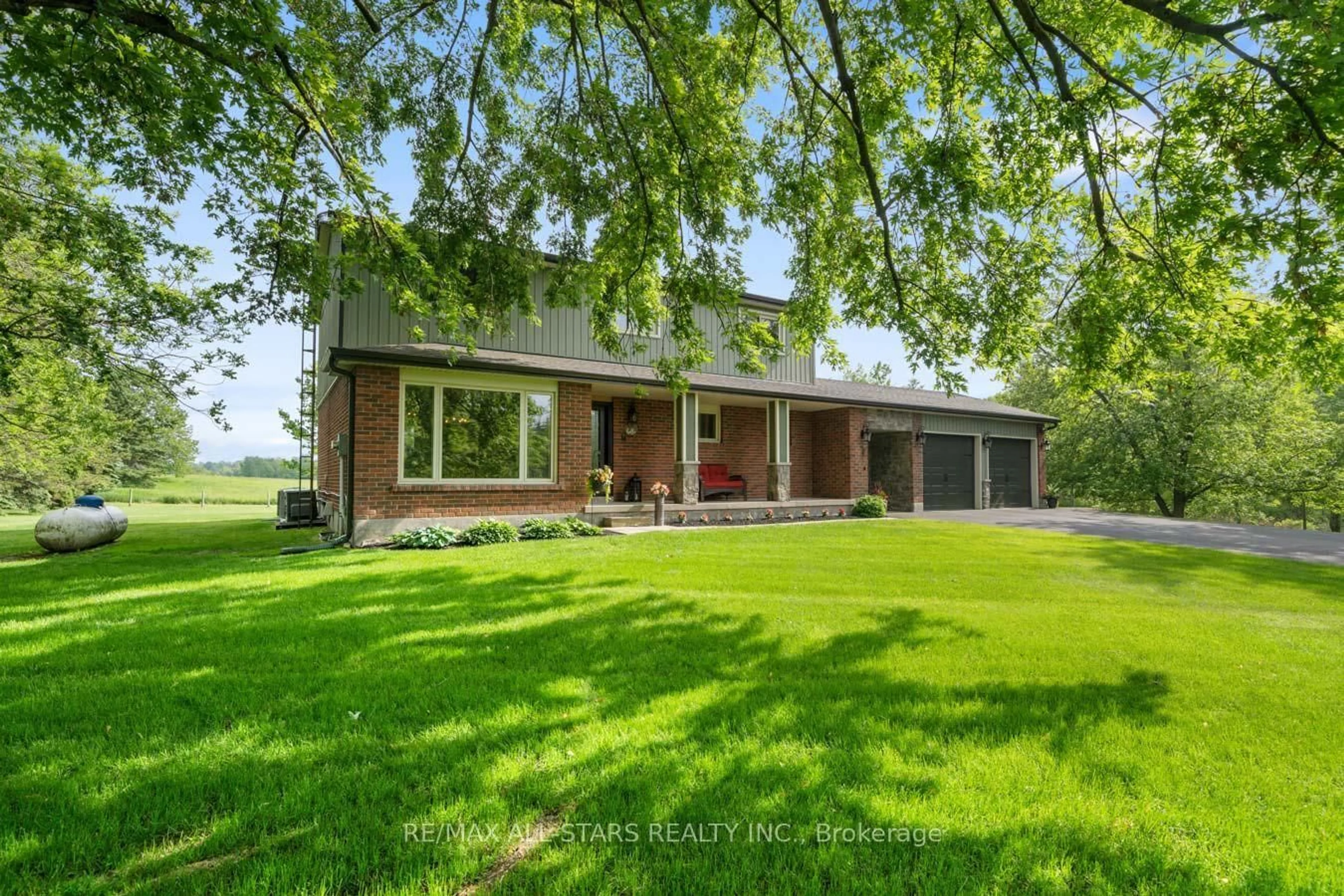 Home with brick exterior material, street for 30 Scugog Line 6, Scugog Ontario L9L 1B2