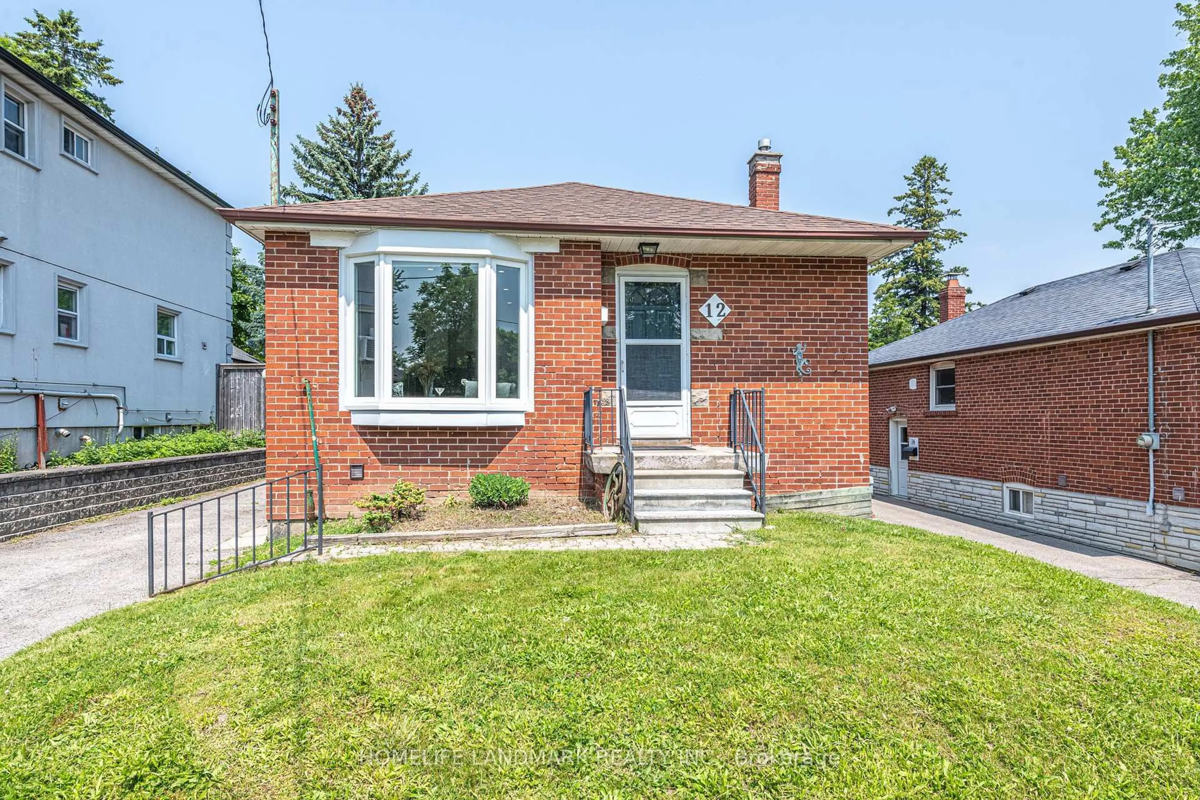 Home with brick exterior material, street for 12 Bayard Ave, Toronto Ontario M1R 4A3