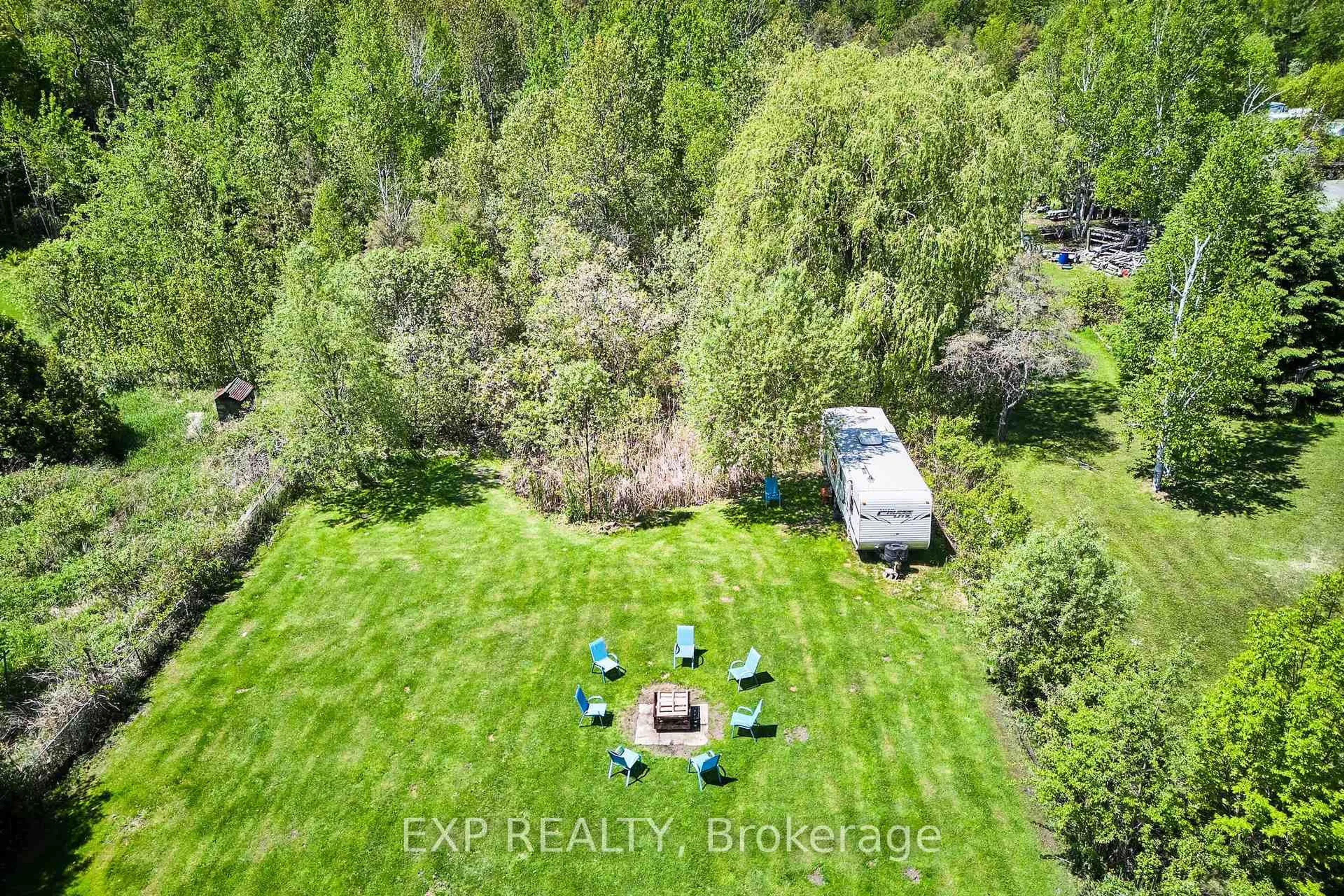 A pic from outside/outdoor area/front of a property/back of a property/a pic from drone, forest/trees view for 3388 Courtice Rd, Clarington Ontario L1E 2L7
