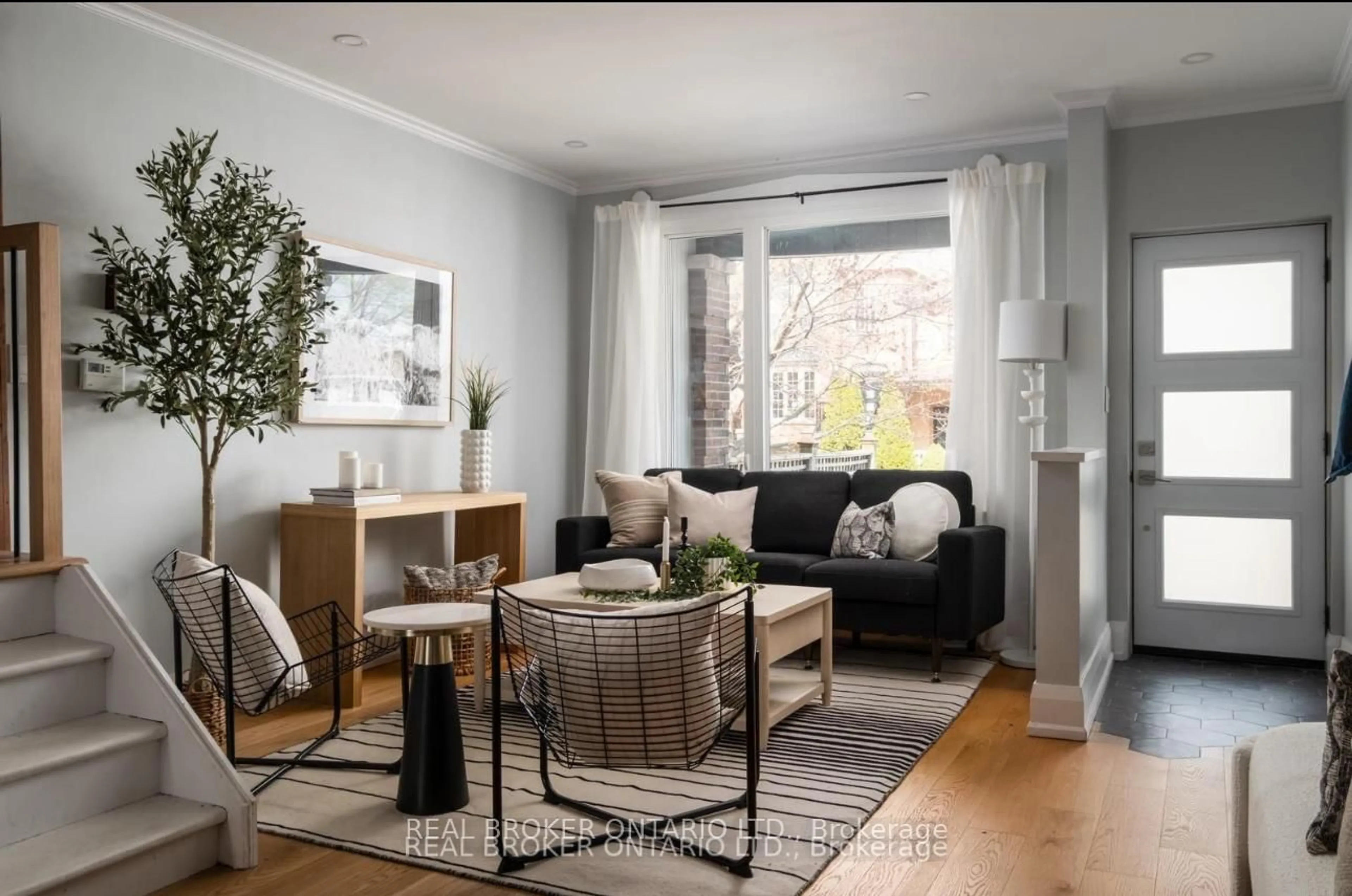 Living room with furniture, wood/laminate floor for 158 Golfview Ave, Toronto Ontario M4E 2K5