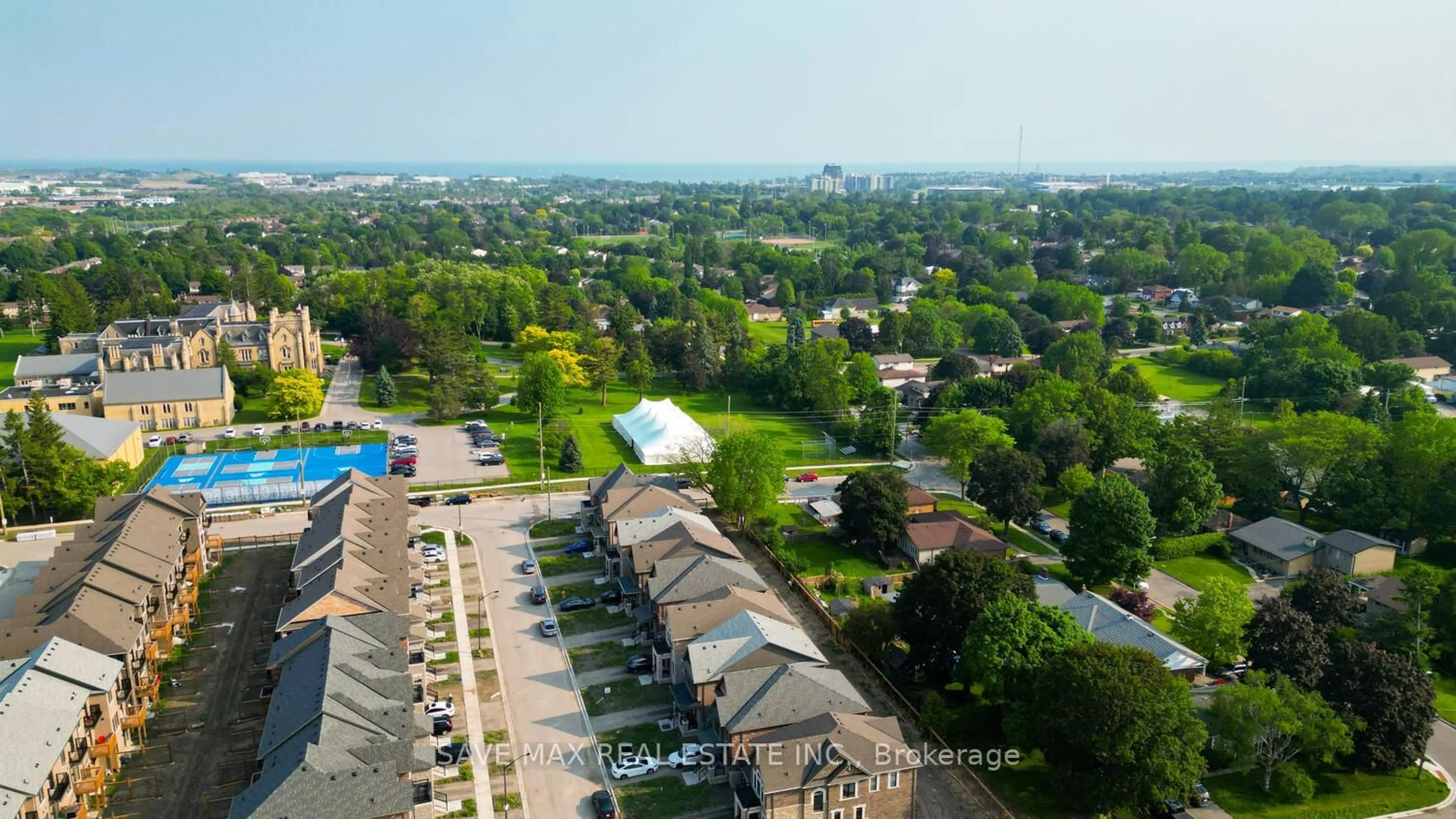 A pic from outside/outdoor area/front of a property/back of a property/a pic from drone, city buildings view from balcony for 580 Mary St #214, Whitby Ontario L1N 2R3