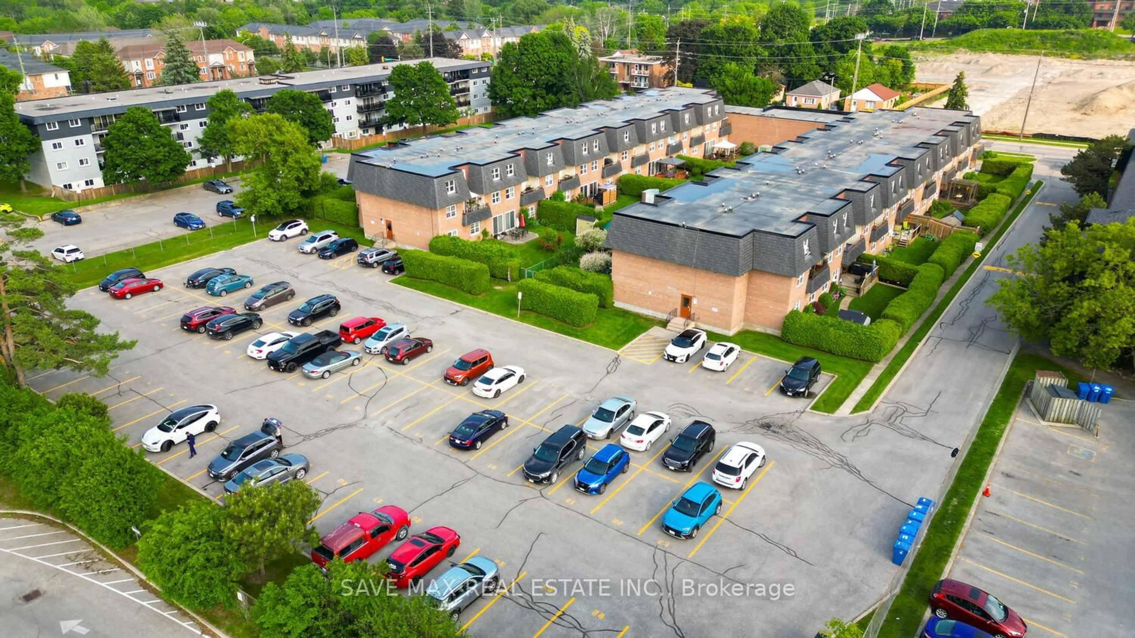 A pic from outside/outdoor area/front of a property/back of a property/a pic from drone, street for 580 Mary St #214, Whitby Ontario L1N 2R3