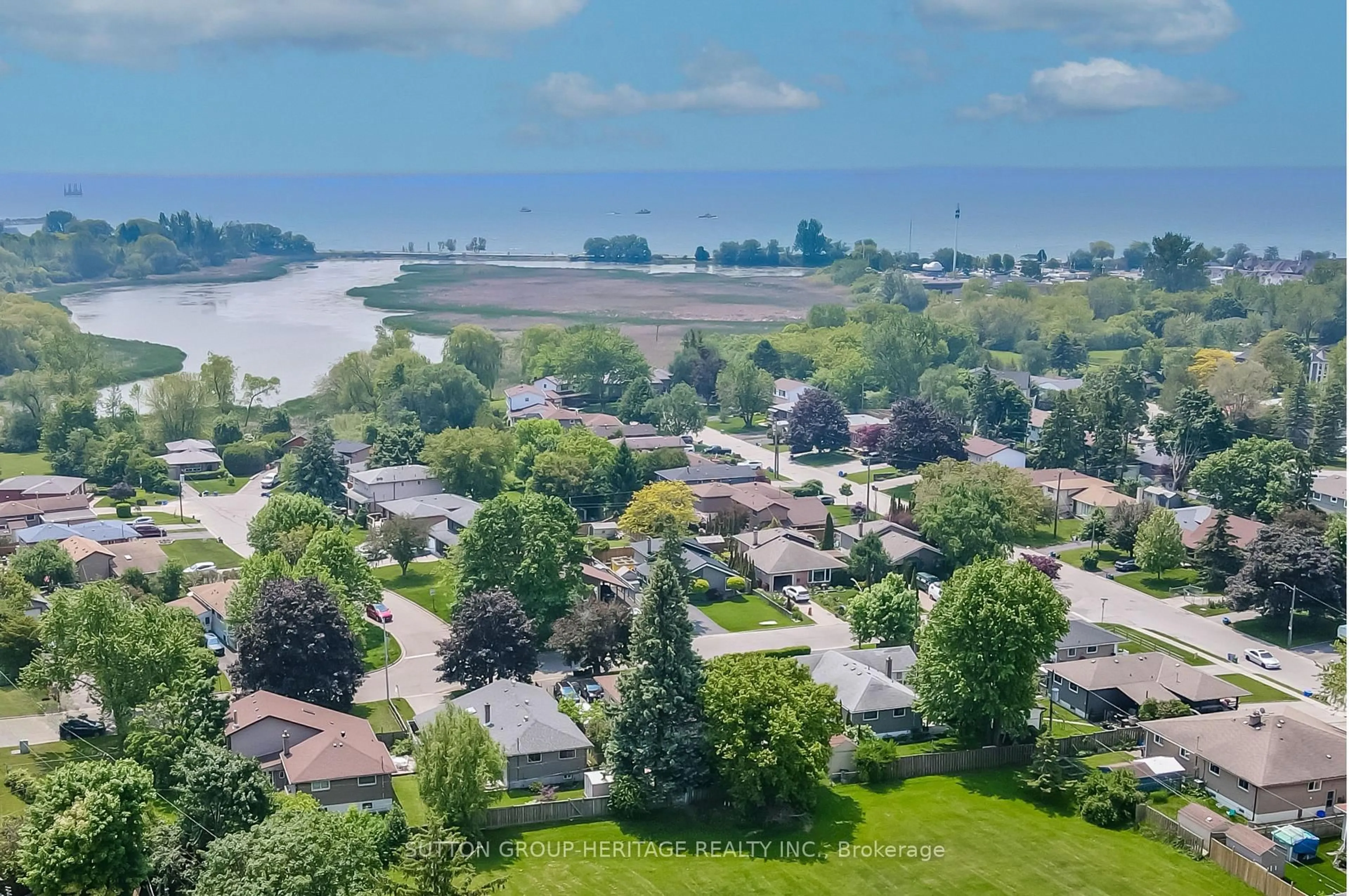 A pic from outside/outdoor area/front of a property/back of a property/a pic from drone, water/lake/river/ocean view for 1406 Colmar Ave, Pickering Ontario L1W 1C3