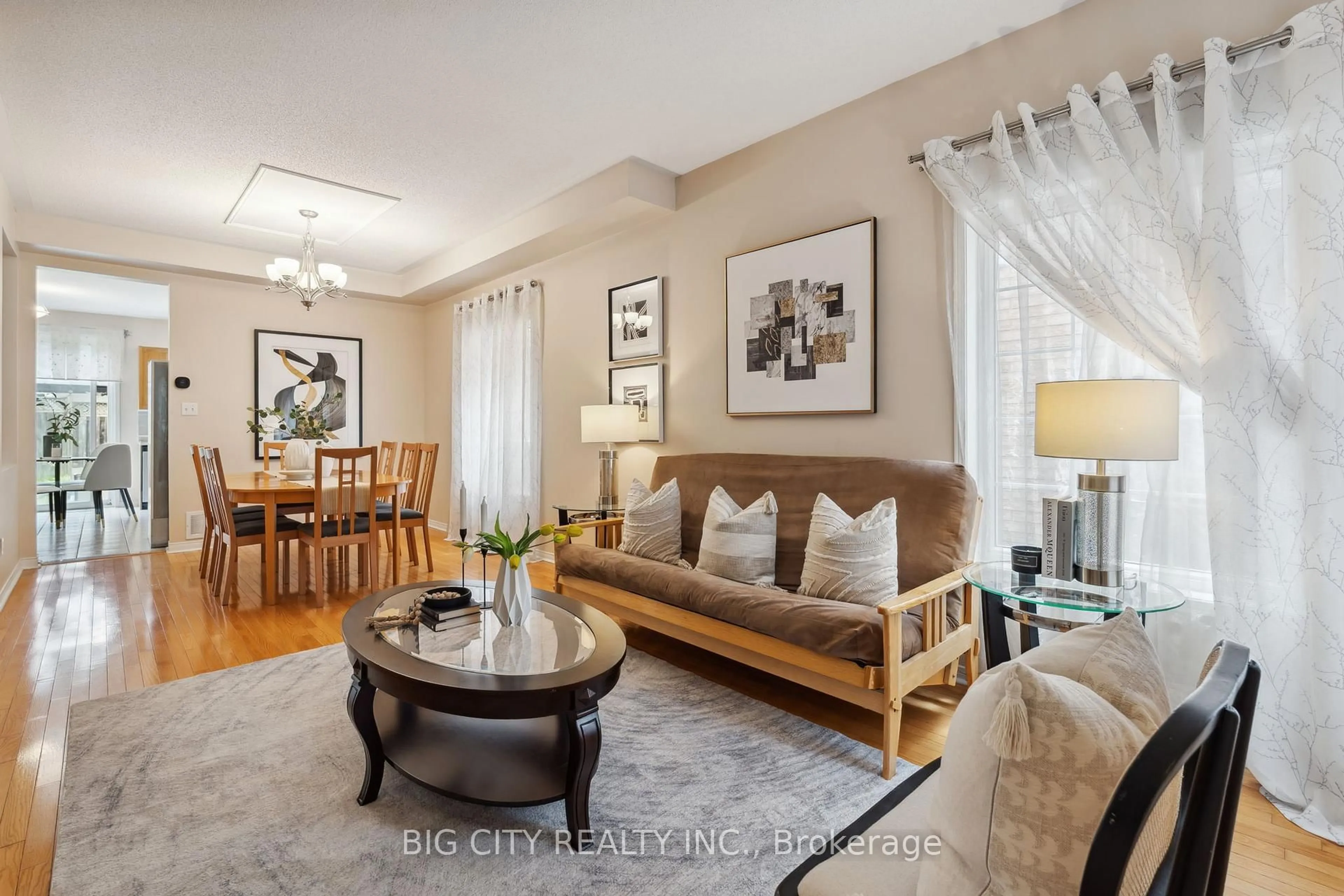 Living room with furniture, wood/laminate floor for 37 Castleford Dr, Toronto Ontario M1T 3X4