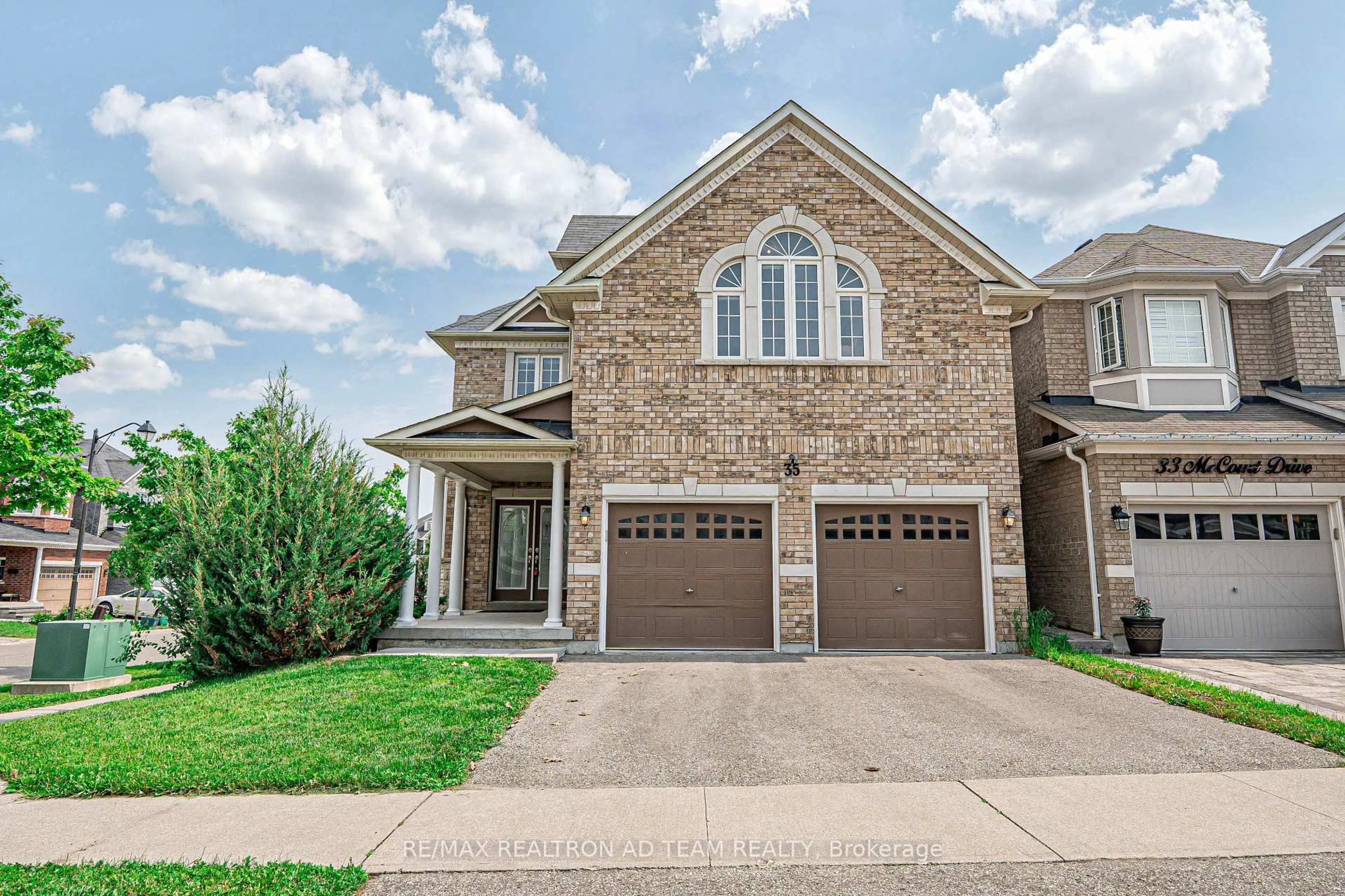 Home with brick exterior material, street for 35 Mccourt Dr, Ajax Ontario L1Z 0P1