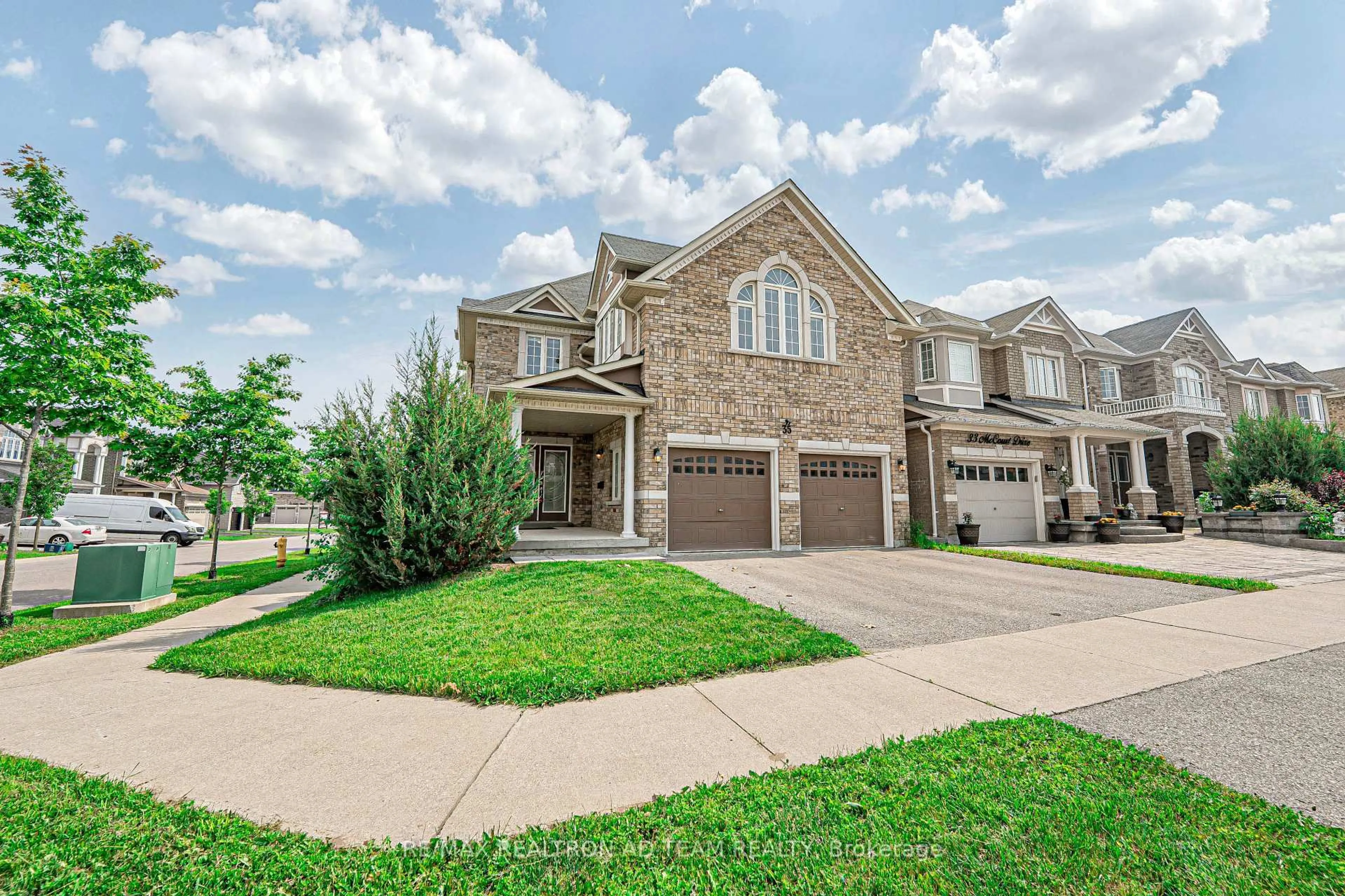Home with brick exterior material, street for 35 Mccourt Dr, Ajax Ontario L1Z 0P1