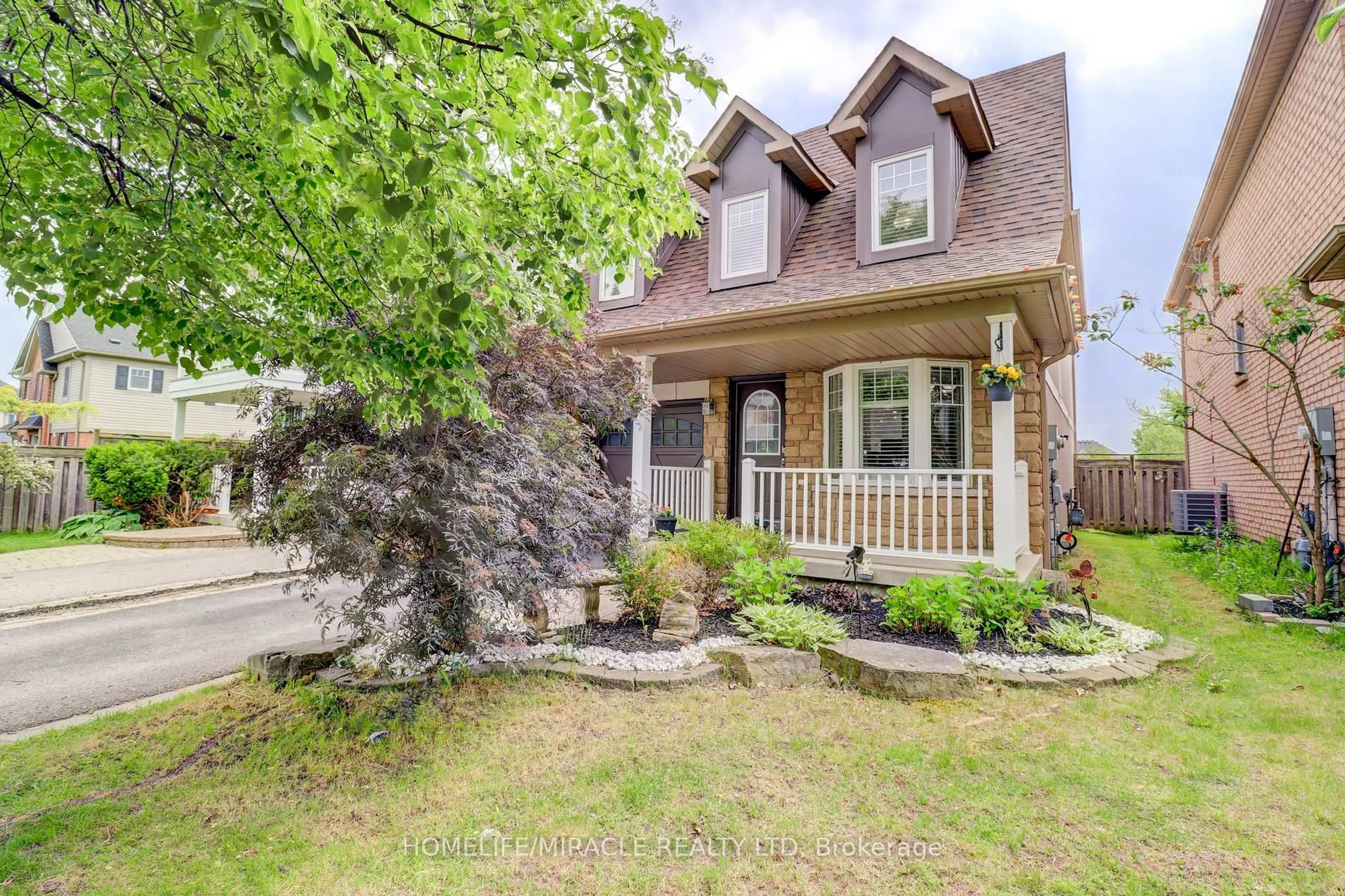 Home with brick exterior material, street for 12 Breezewood Crt, Whitby Ontario L1M 2L4