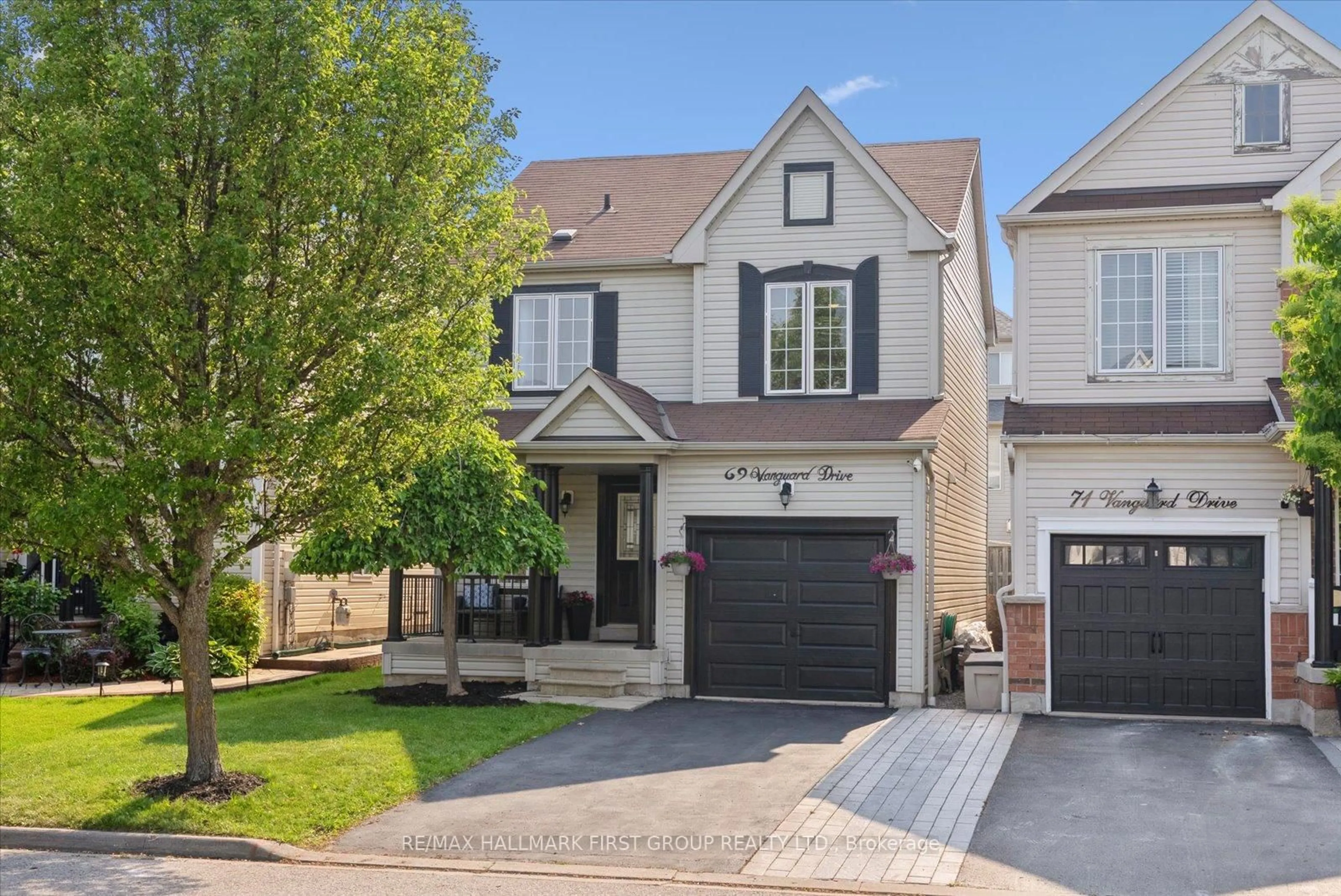 Home with brick exterior material, street for 69 Vanguard Dr, Whitby Ontario L1M 2P1