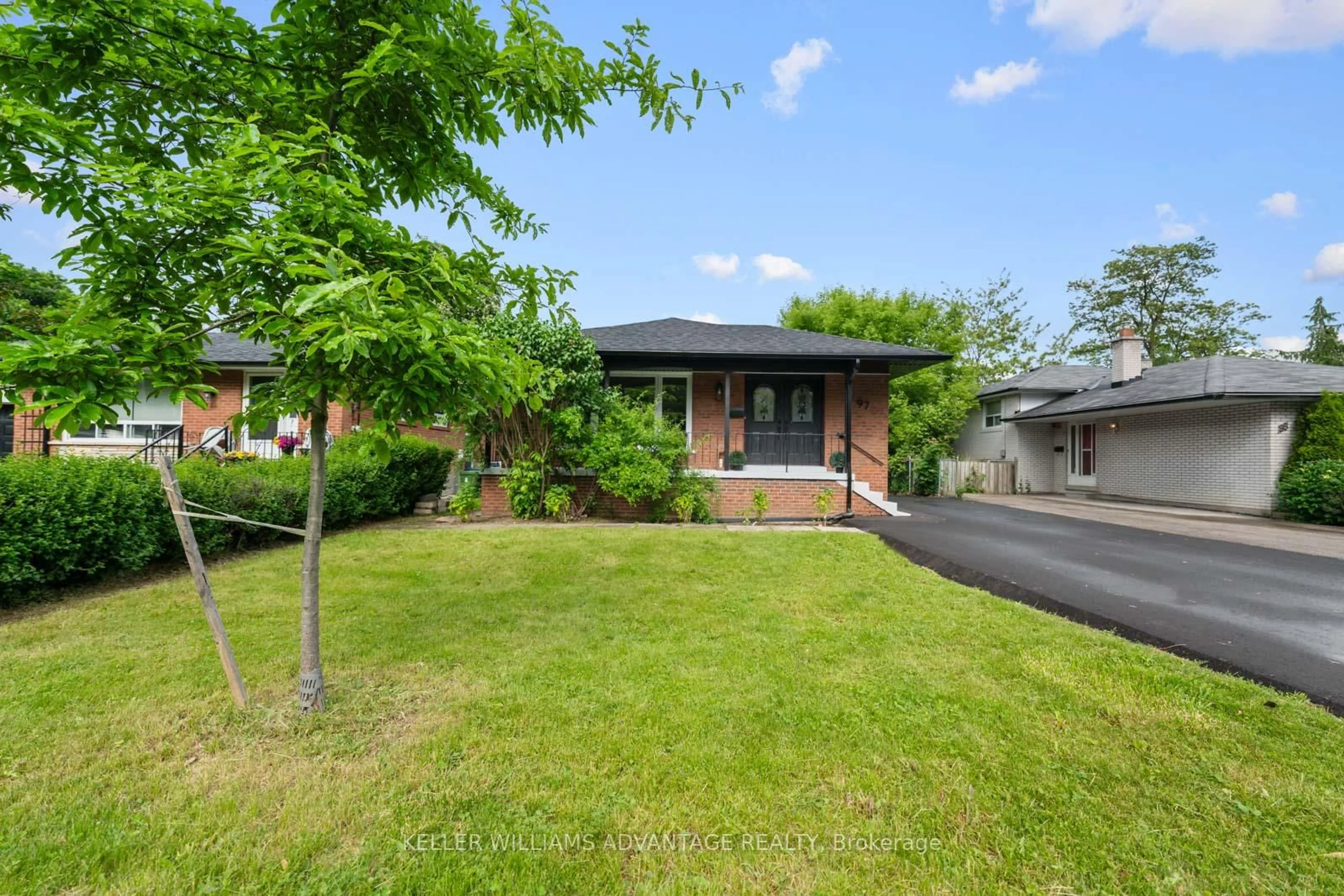 Home with brick exterior material, street for 97 Gradwell Dr, Toronto Ontario M1M 2N3