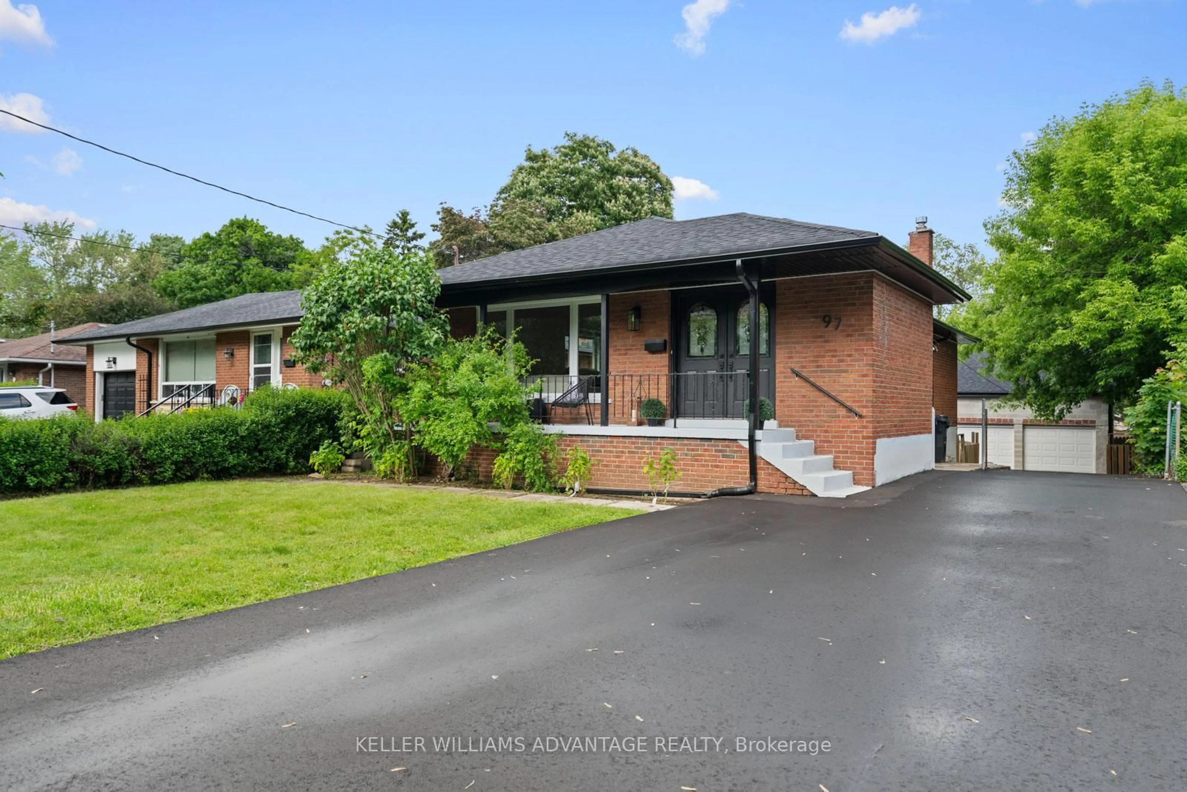 Home with brick exterior material, street for 97 Gradwell Dr, Toronto Ontario M1M 2N3