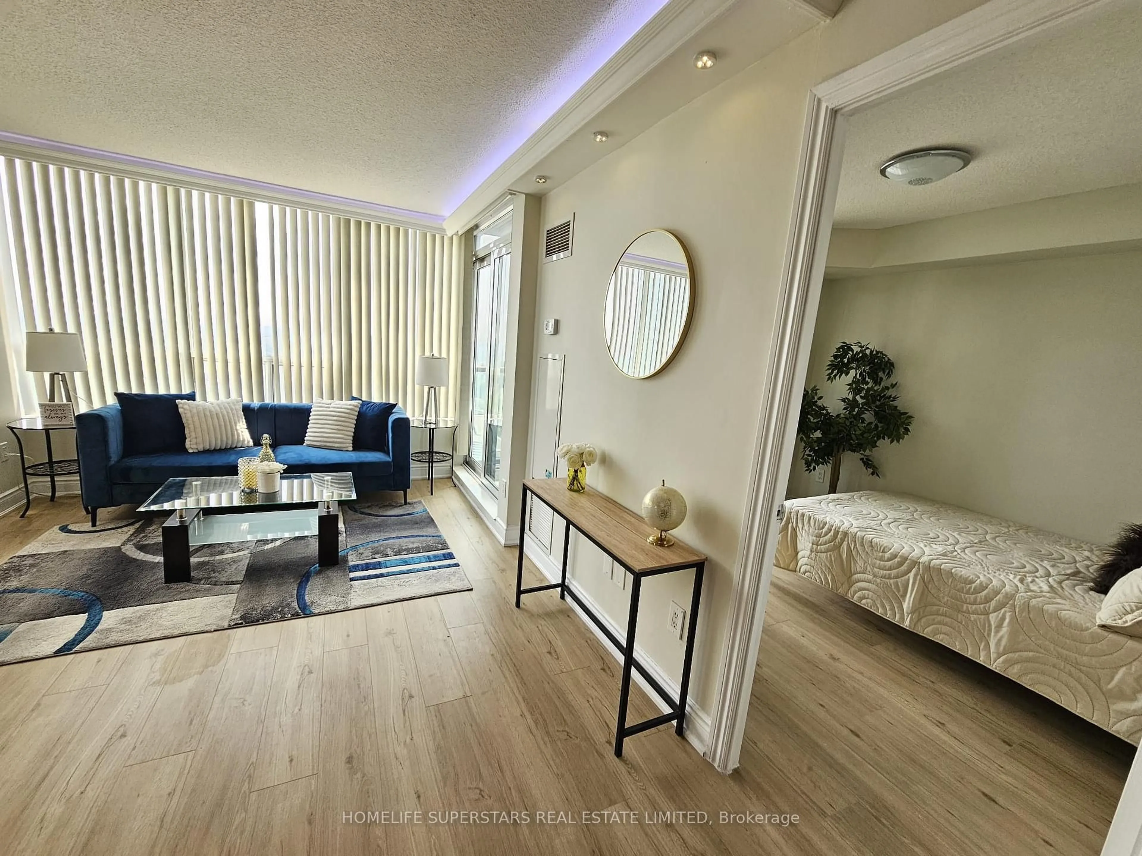 Living room with furniture, wood/laminate floor for 60 Brian Harrison Way #2109, Toronto Ontario M1P 5J5