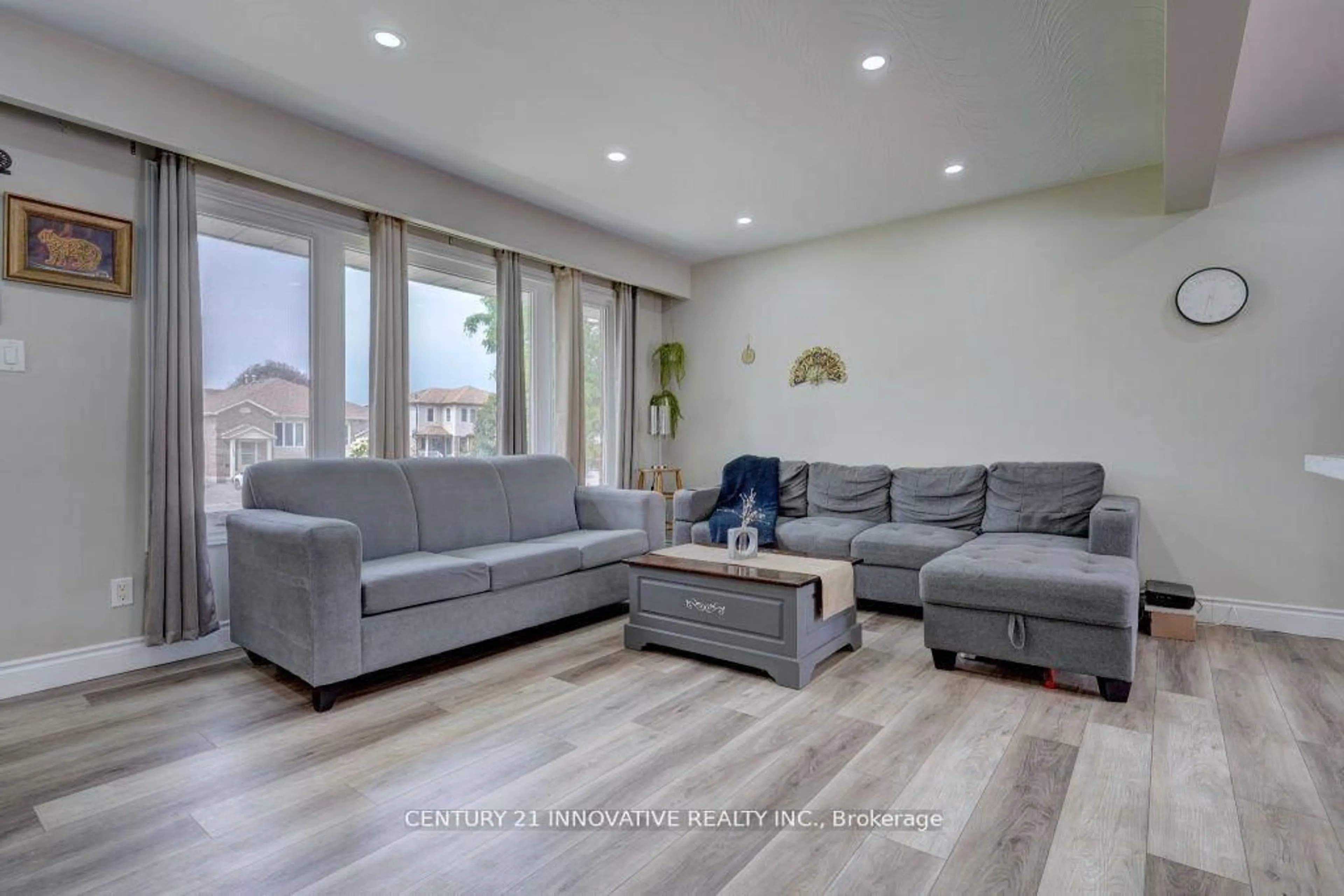 Living room with furniture, wood/laminate floor for 1431 Park Rd, Oshawa Ontario L1J 4K4