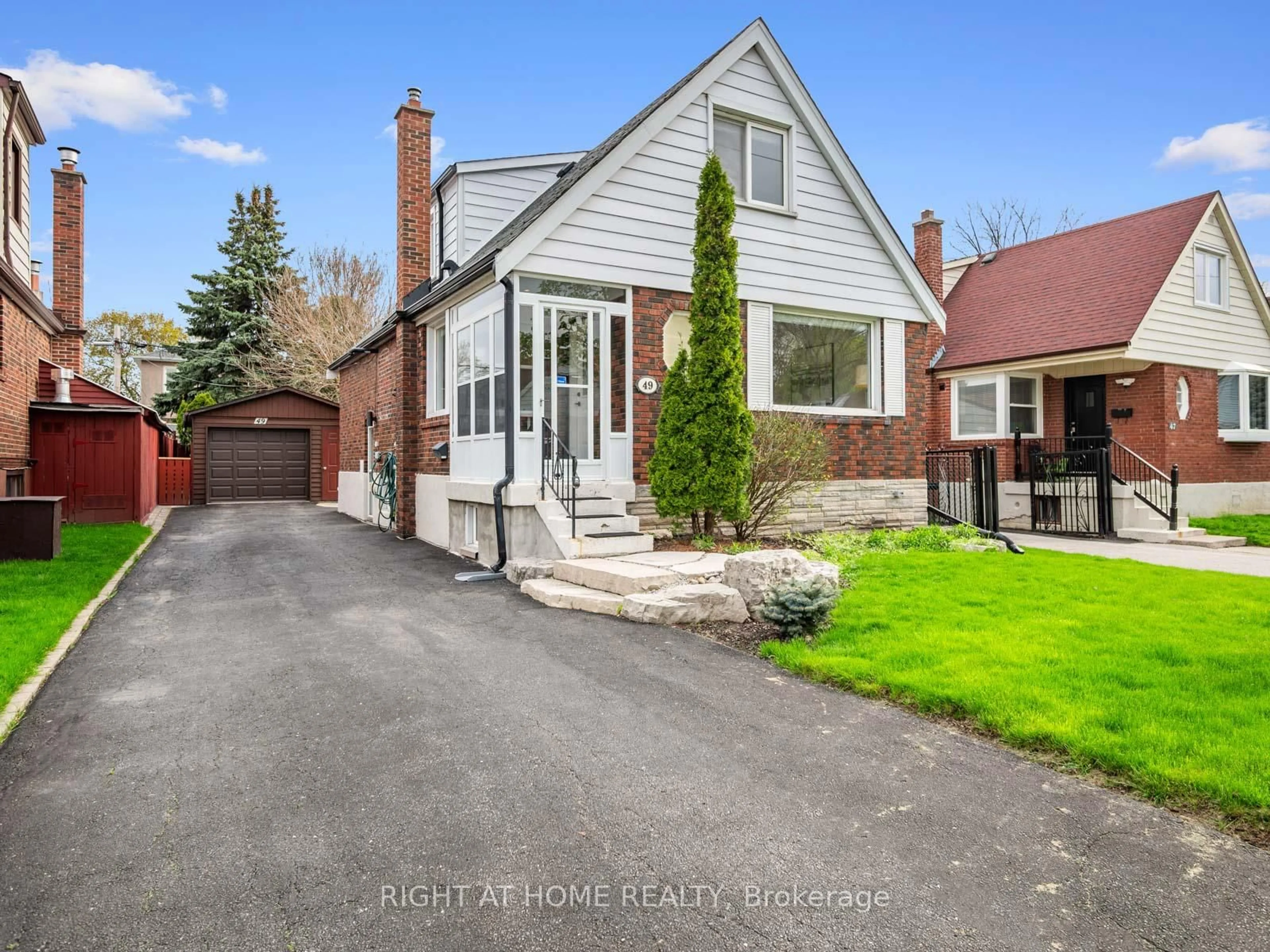 Home with brick exterior material, street for 49 Amsterdam Ave, Toronto Ontario M4B 2B9
