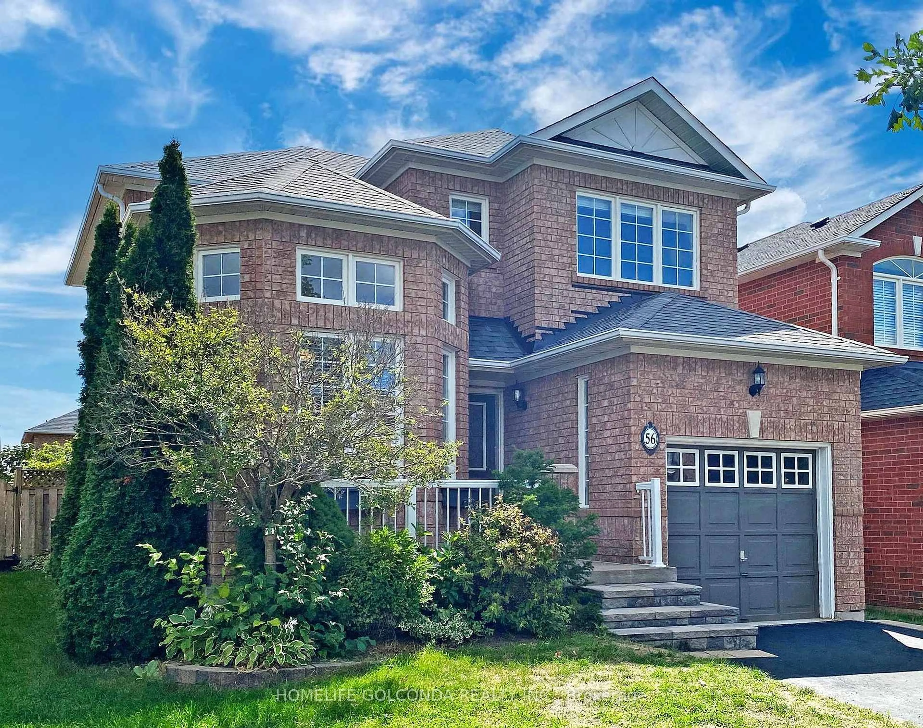 Home with brick exterior material, street for 56 Lurosa Cres, Whitby Ontario L1R 3A9