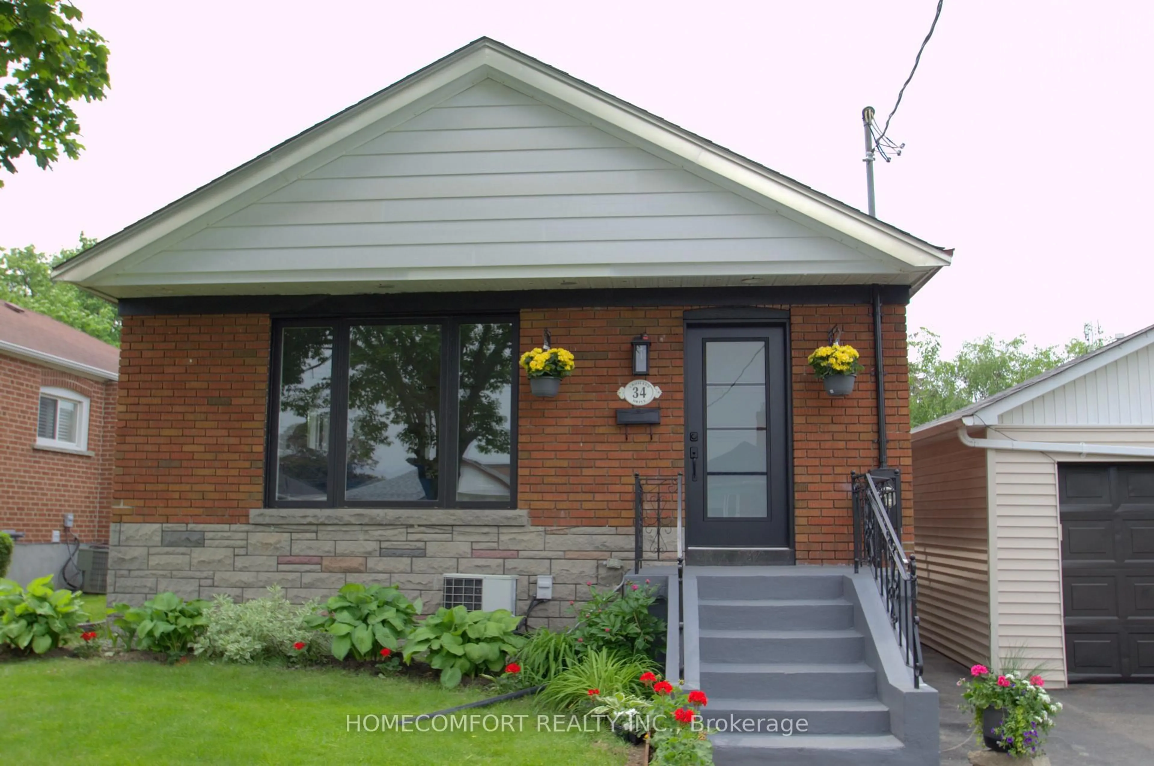 Home with brick exterior material, street for 34 Crosland Dr, Toronto Ontario M1R 4M8