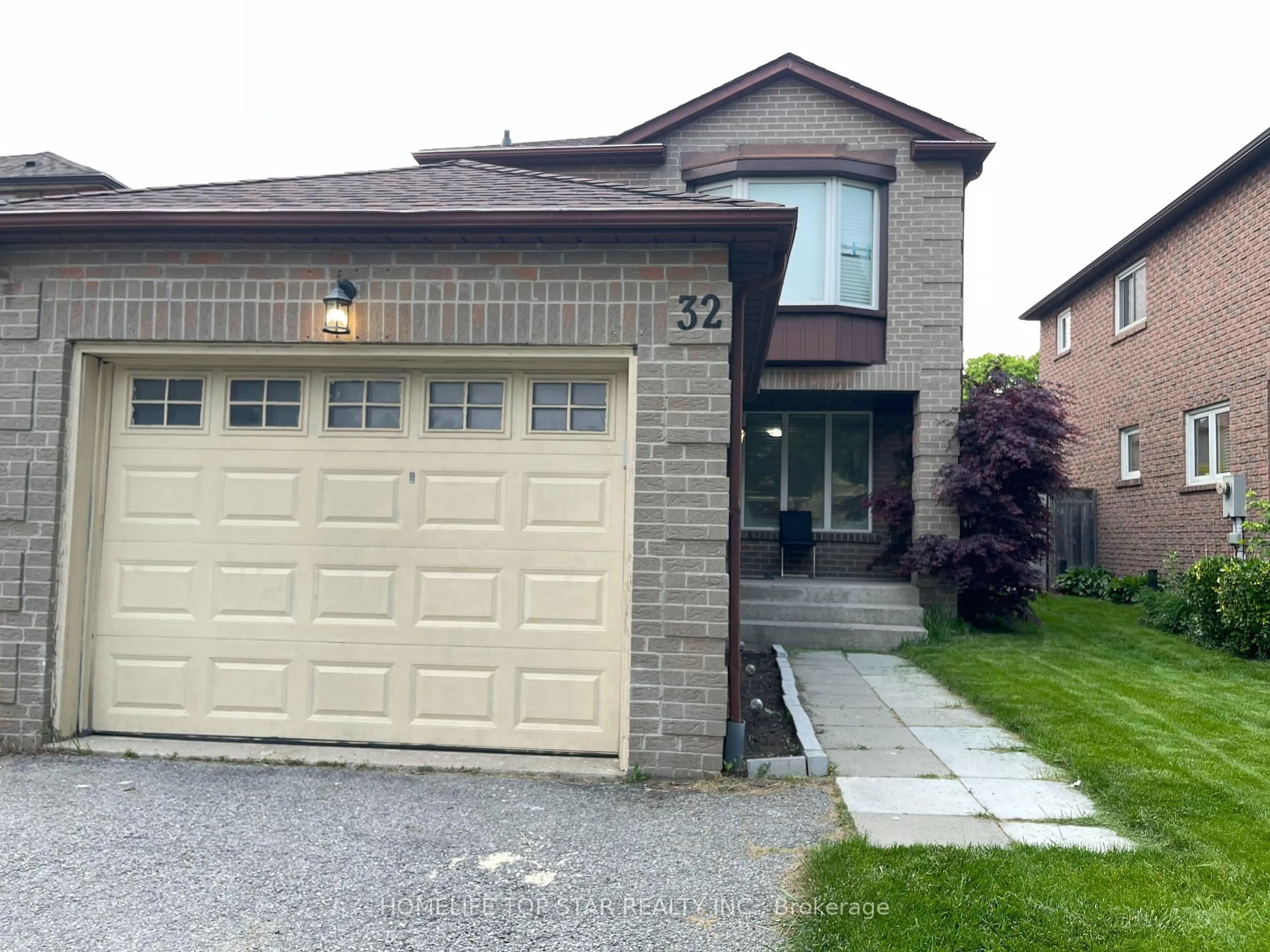 Home with brick exterior material, street for 32 Millington Cres, Ajax Ontario L1T 1R3