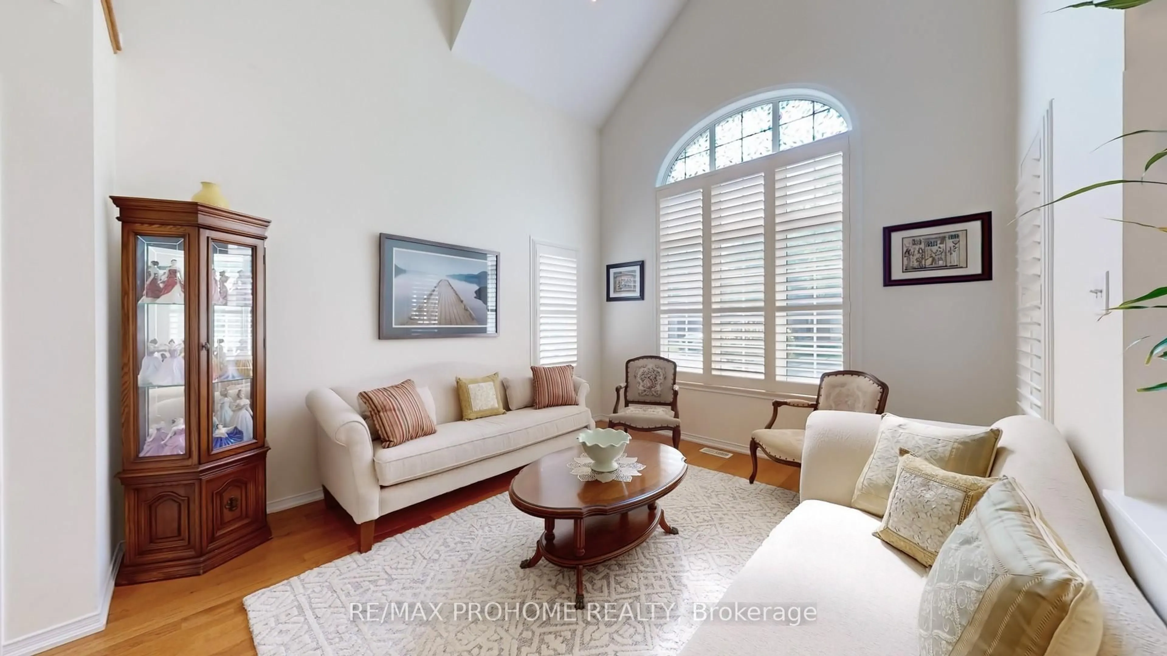 Living room with furniture, wood/laminate floor for 64 Grainger Cres, Ajax Ontario L1T 4Y6