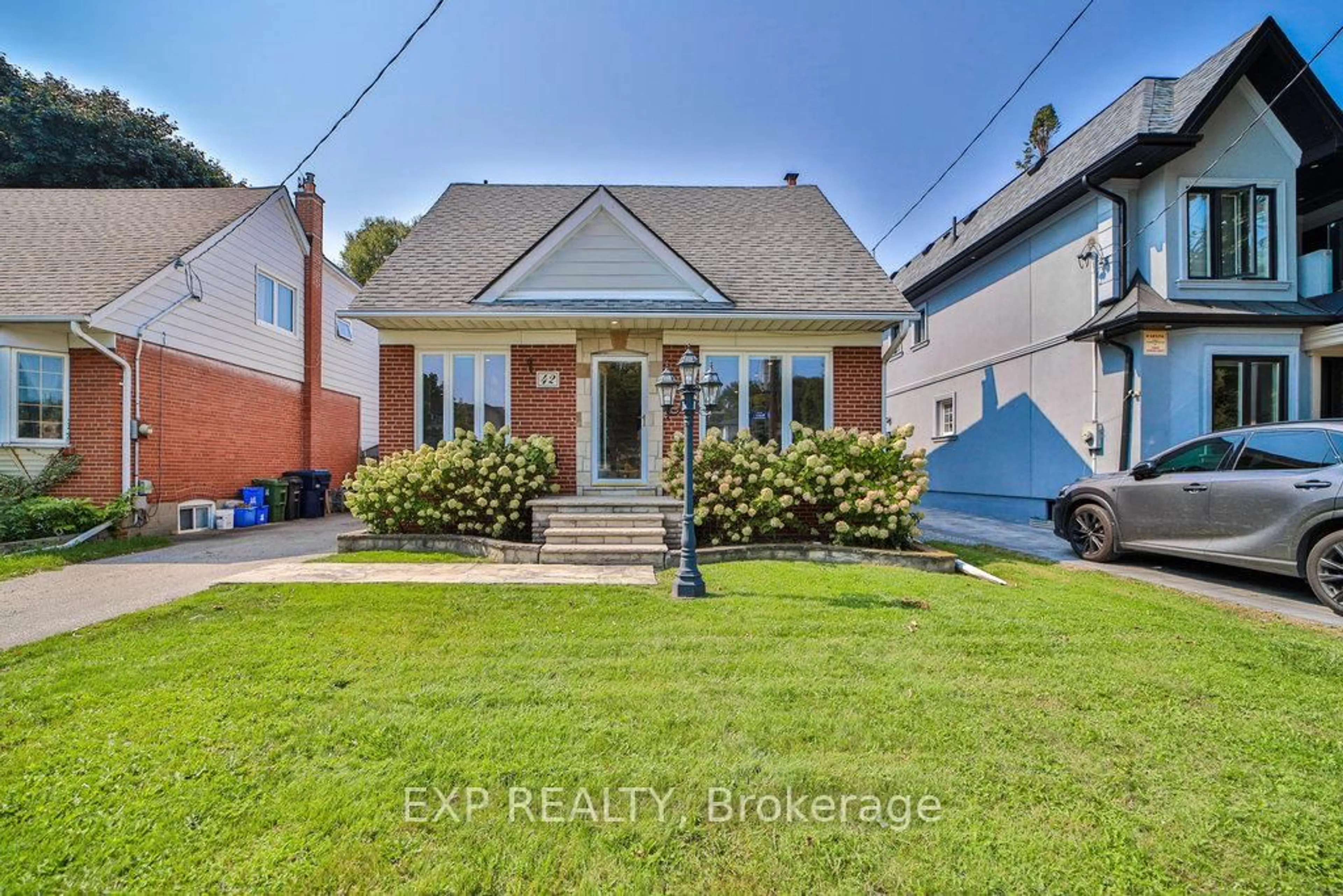 Home with brick exterior material, street for 42 Tower Dr, Toronto Ontario M1R 3N9