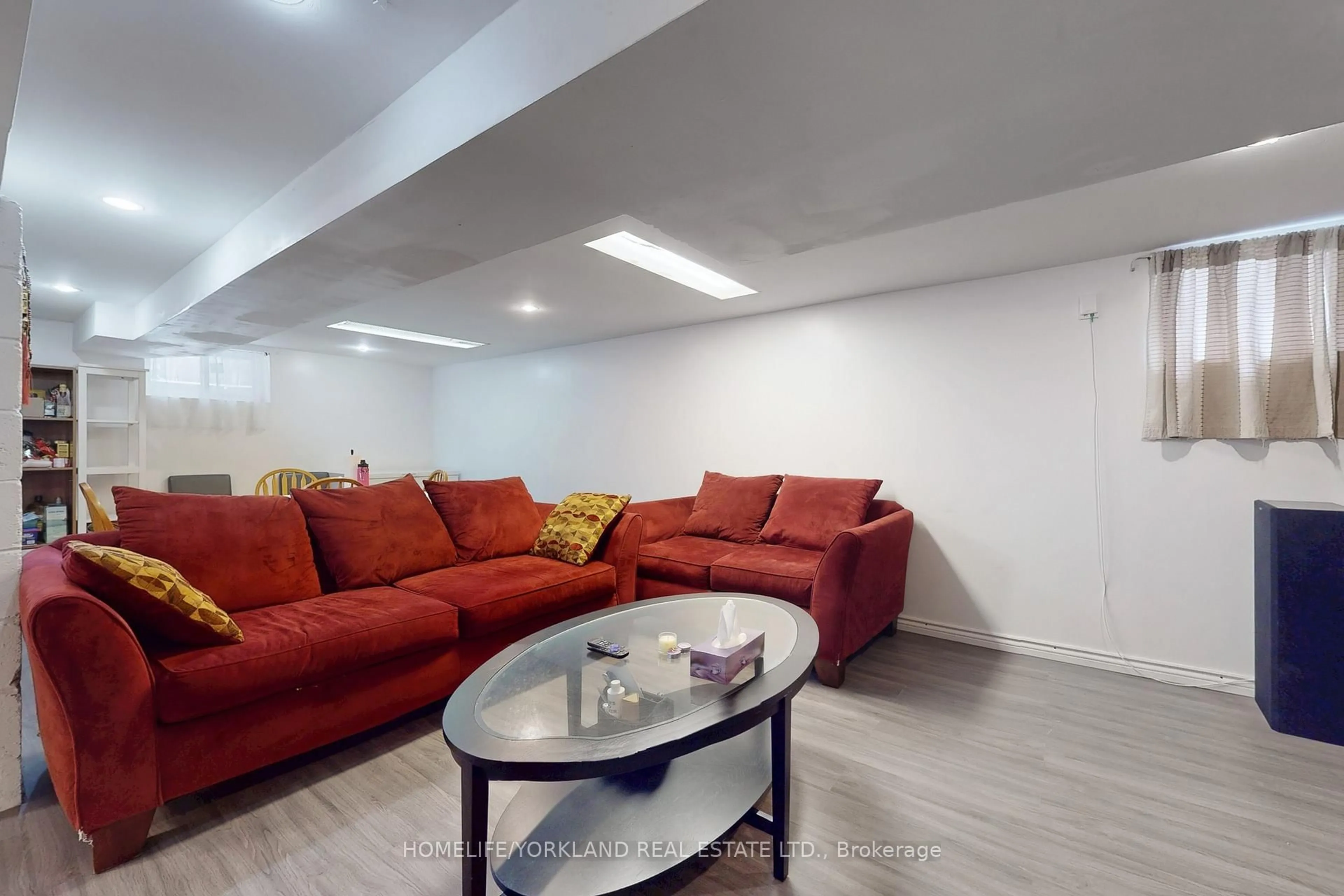 Living room with furniture, unknown for 30 Merrian Rd, Toronto Ontario M1K 3M7