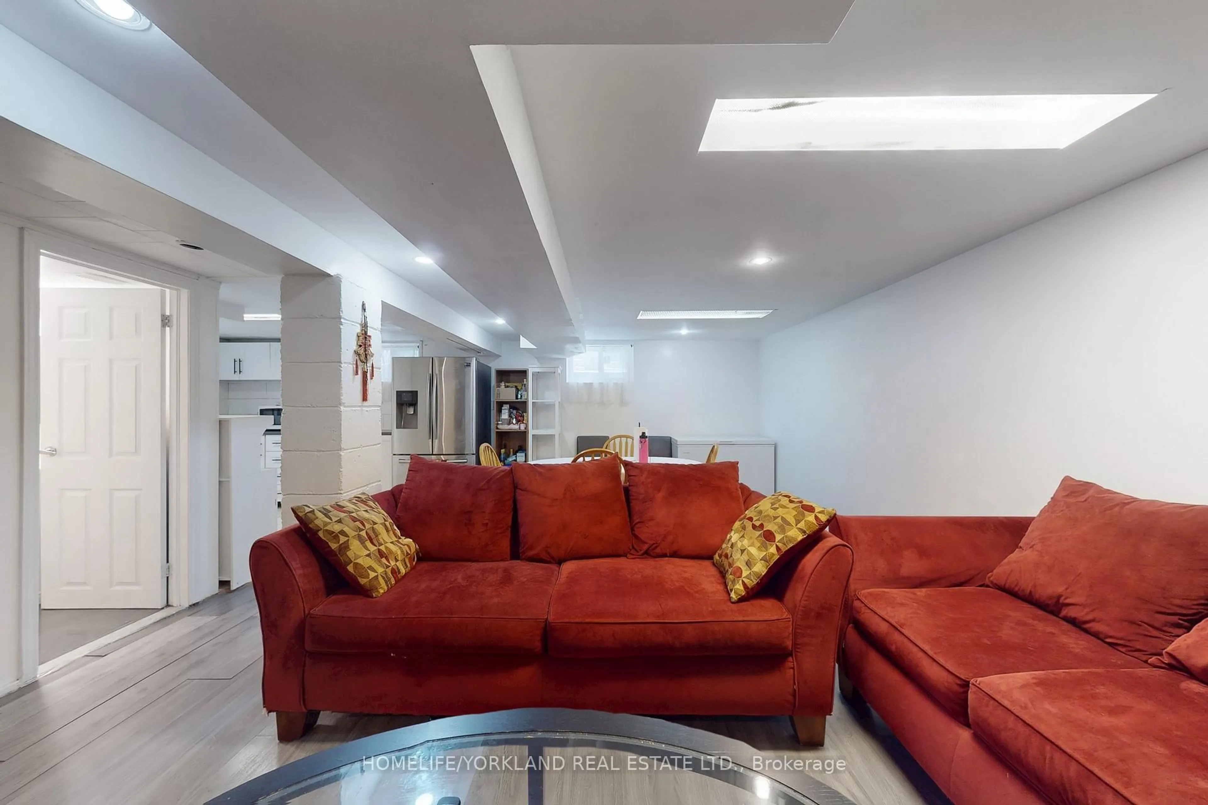 Living room with furniture, unknown for 30 Merrian Rd, Toronto Ontario M1K 3M7