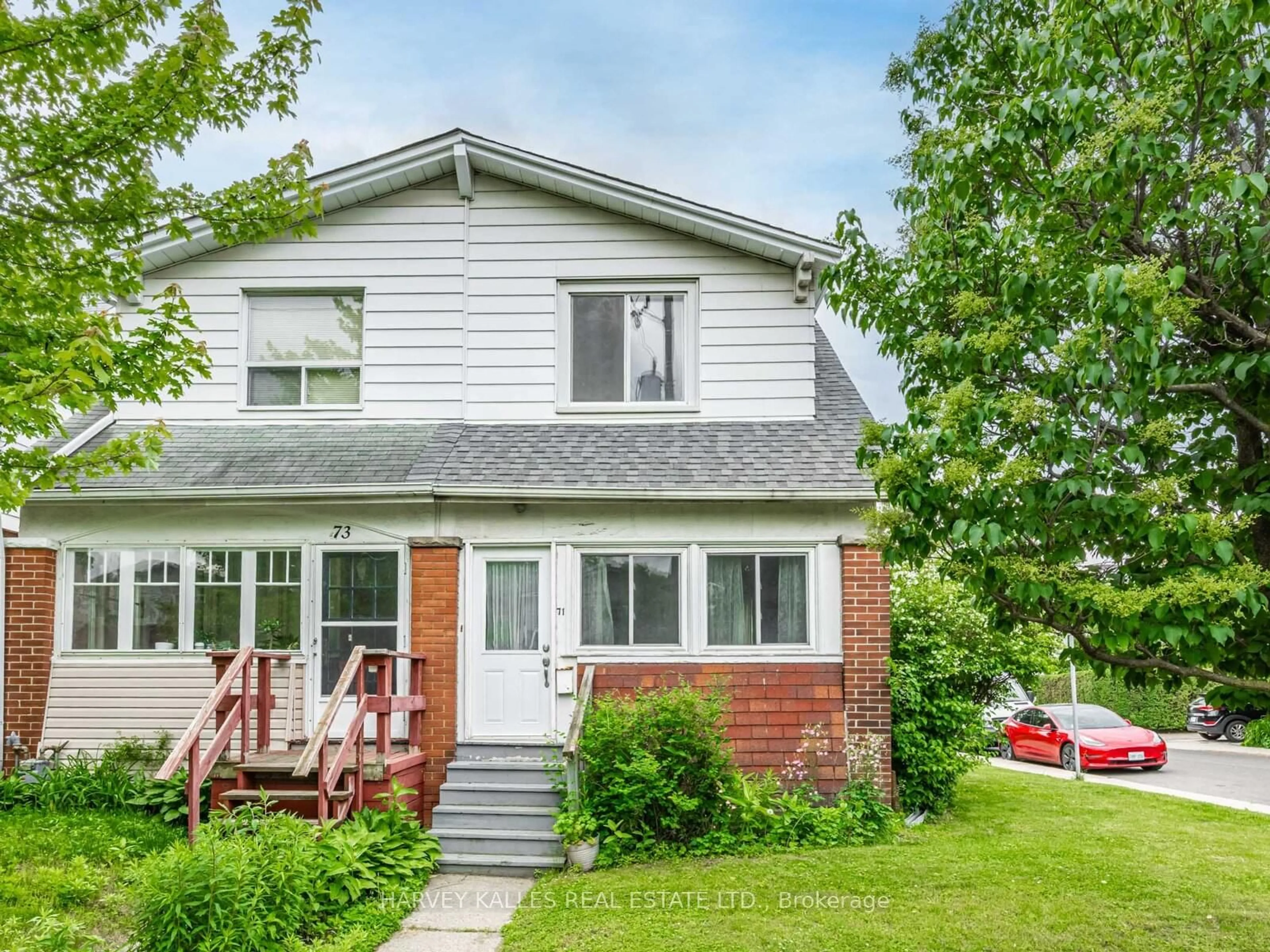 Home with vinyl exterior material, street for 71 Mortimer Ave, Toronto Ontario M4K 2A2