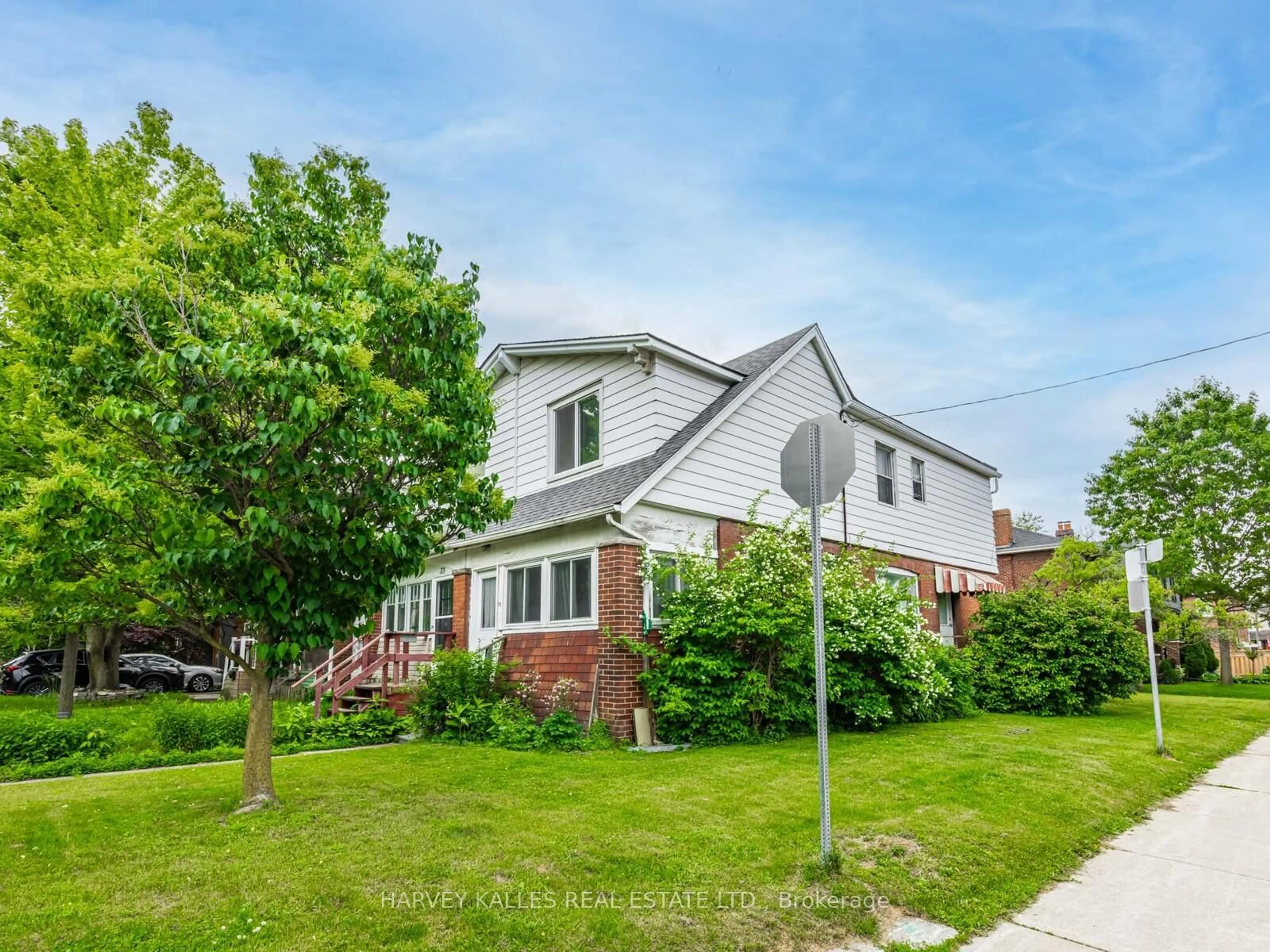Home with brick exterior material, street for 71 Mortimer Ave, Toronto Ontario M4K 2A2