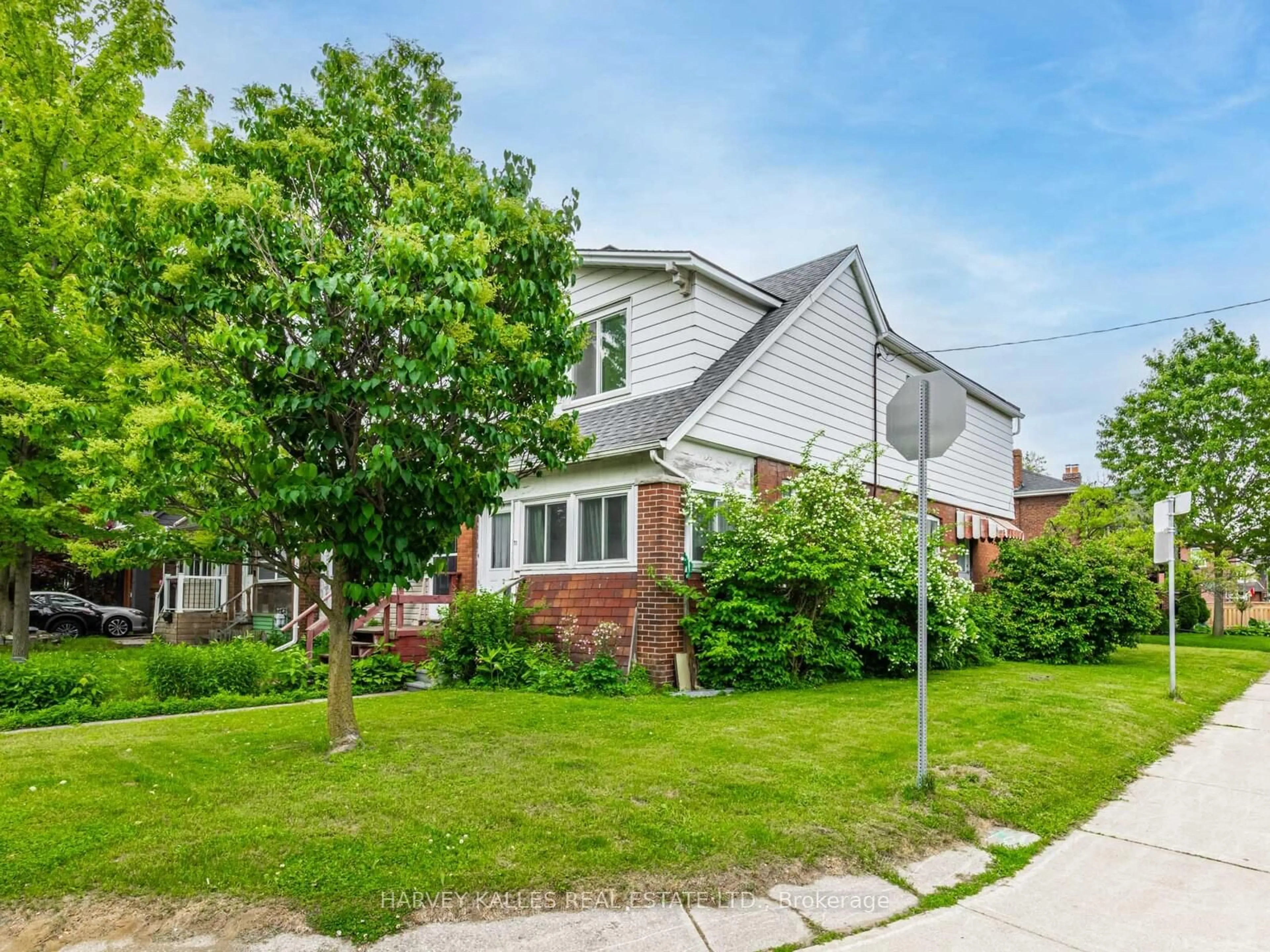 Home with brick exterior material, street for 71 Mortimer Ave, Toronto Ontario M4K 2A2