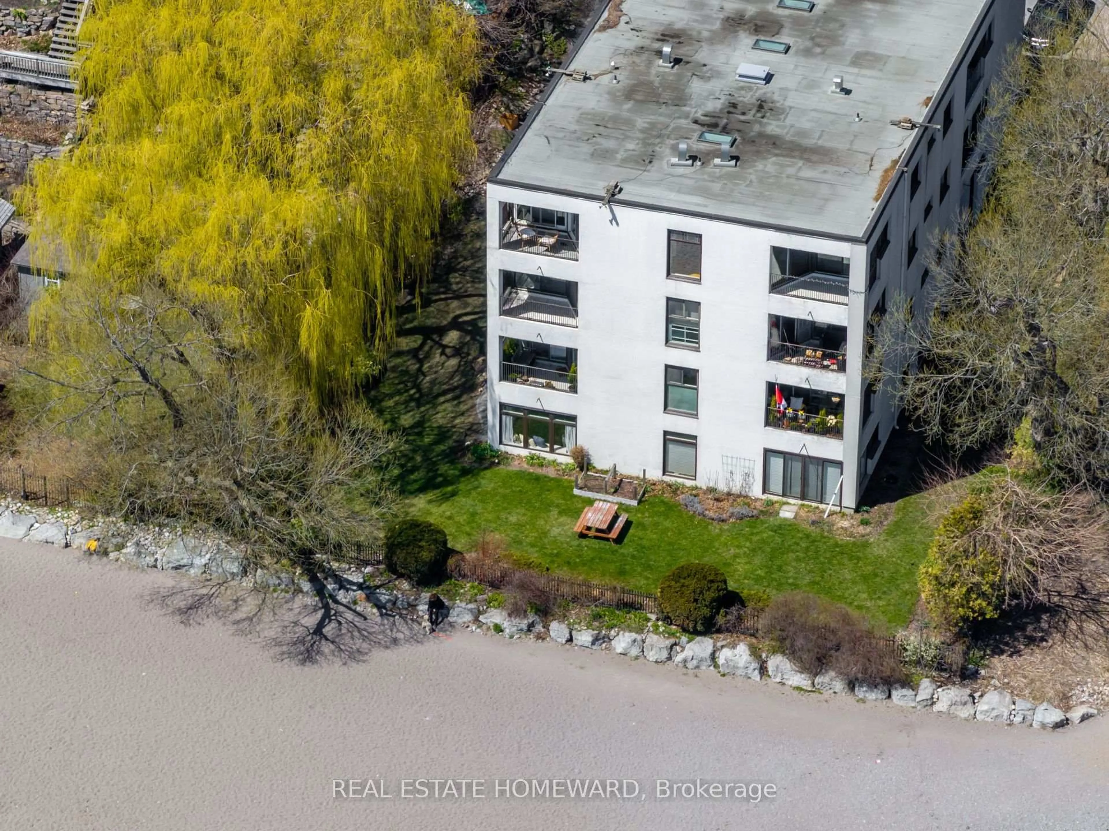 A pic from outside/outdoor area/front of a property/back of a property/a pic from drone, unknown for 2 Nursewood Rd #2, Toronto Ontario M4E 3R8