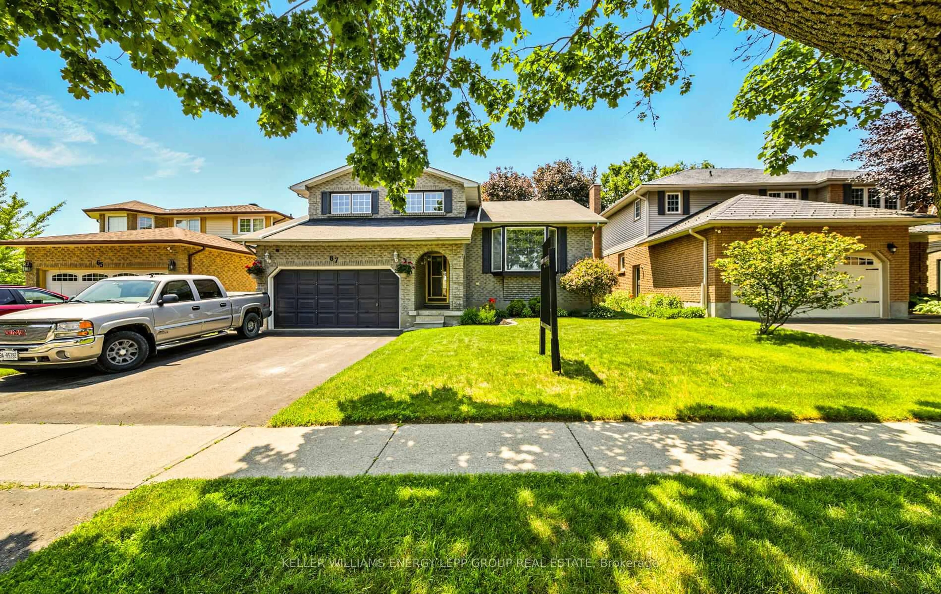 Home with vinyl exterior material, street for 67 Foxhunt Tr, Clarington Ontario L1E 1E4