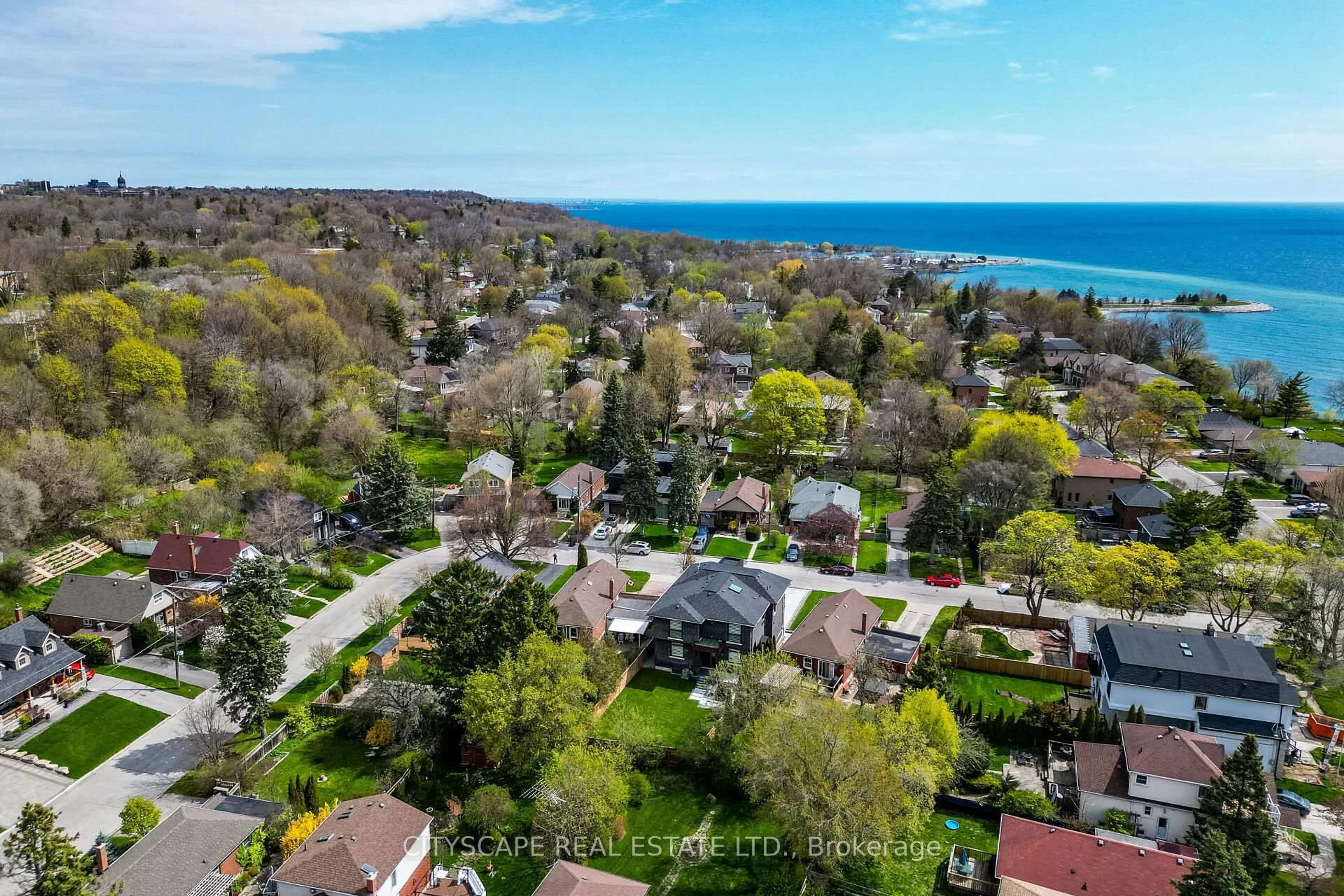 A pic from outside/outdoor area/front of a property/back of a property/a pic from drone, water/lake/river/ocean view for 4 Birchlawn Ave, Toronto Ontario M1N 1H9