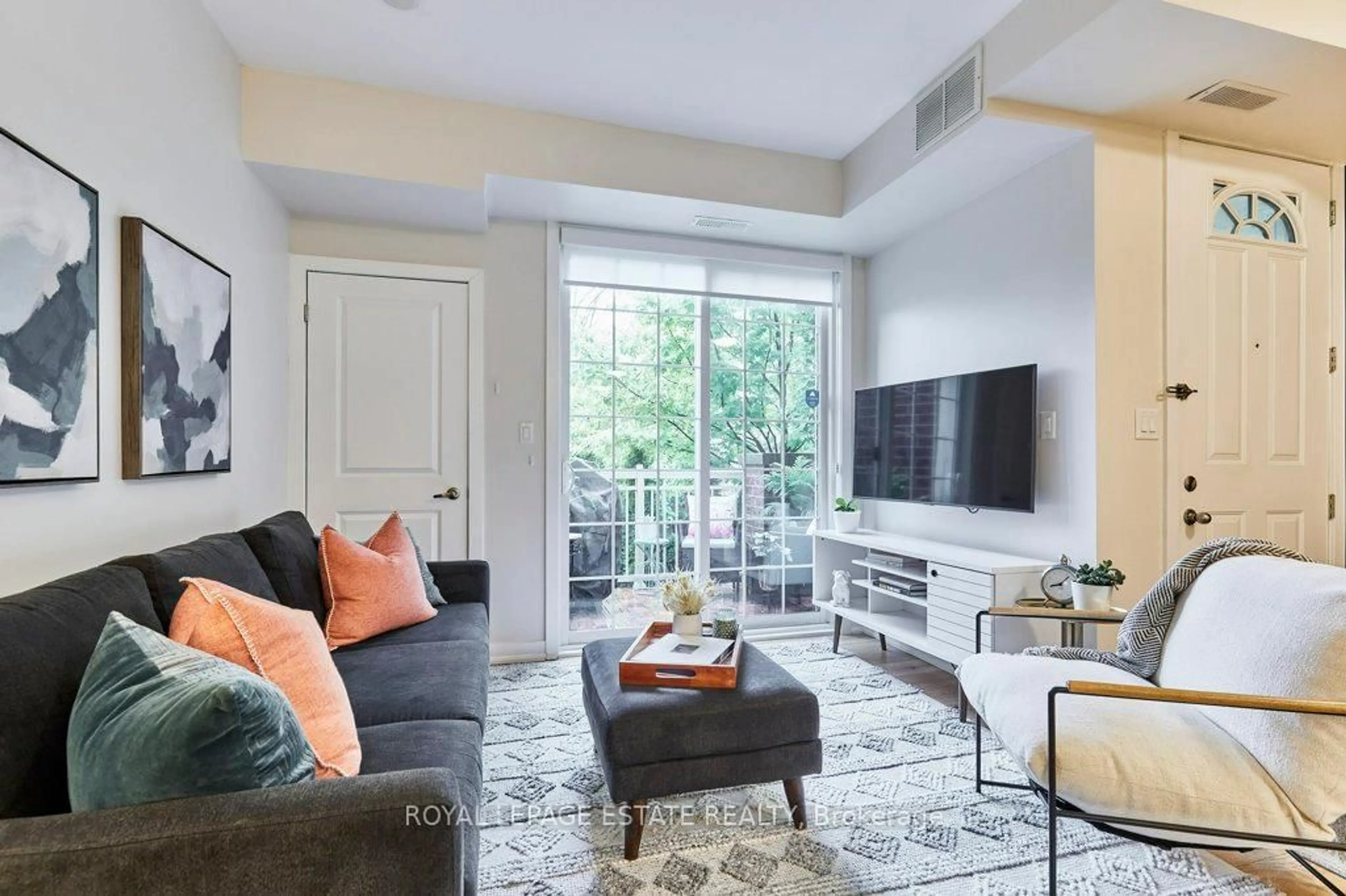 Living room with furniture, unknown for 2320 Gerrard St #128, Toronto Ontario M4E 2E1