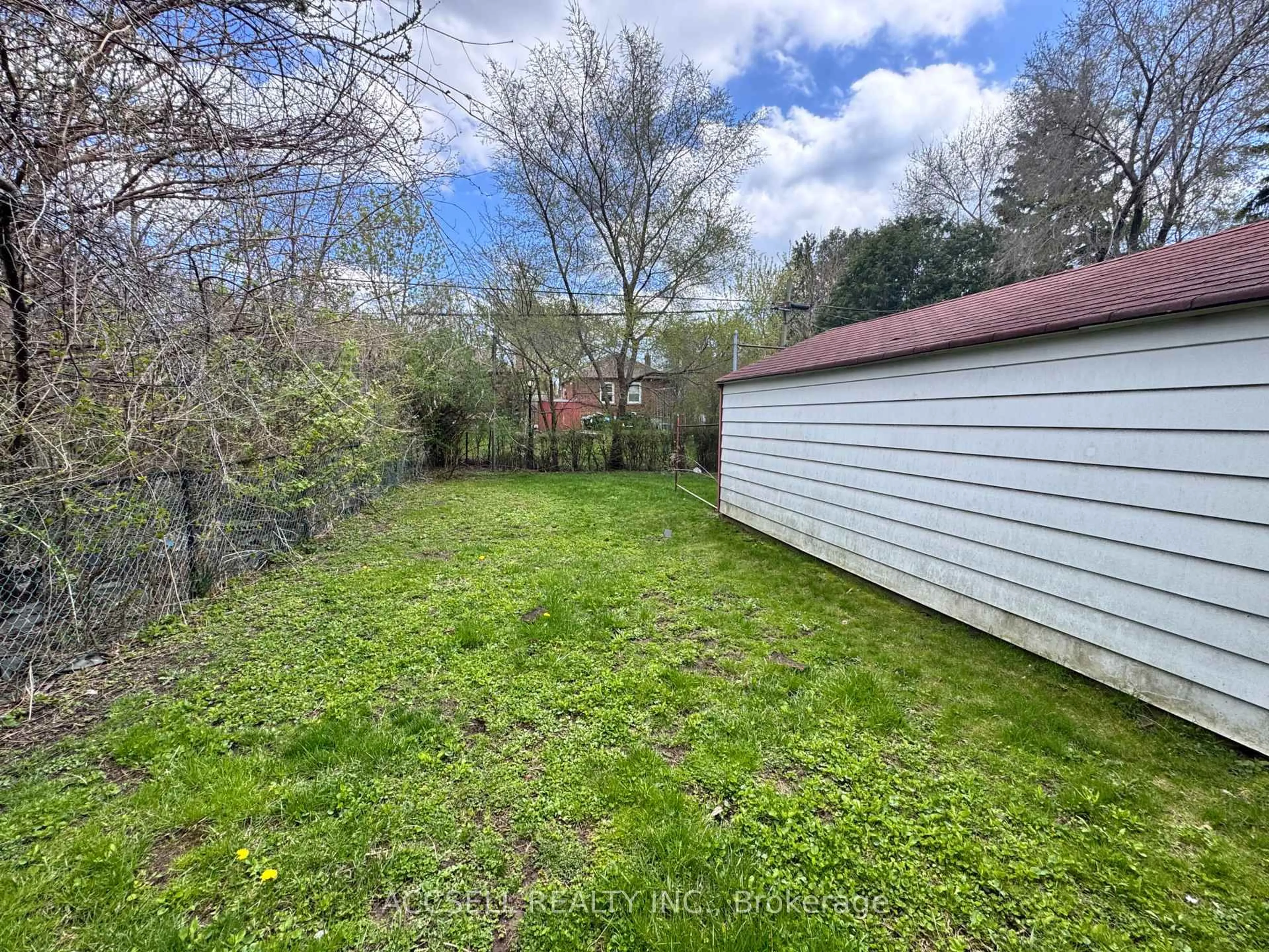 A pic from outside/outdoor area/front of a property/back of a property/a pic from drone, forest/trees view for 493 Dawes Rd, Toronto Ontario M4B 2G5