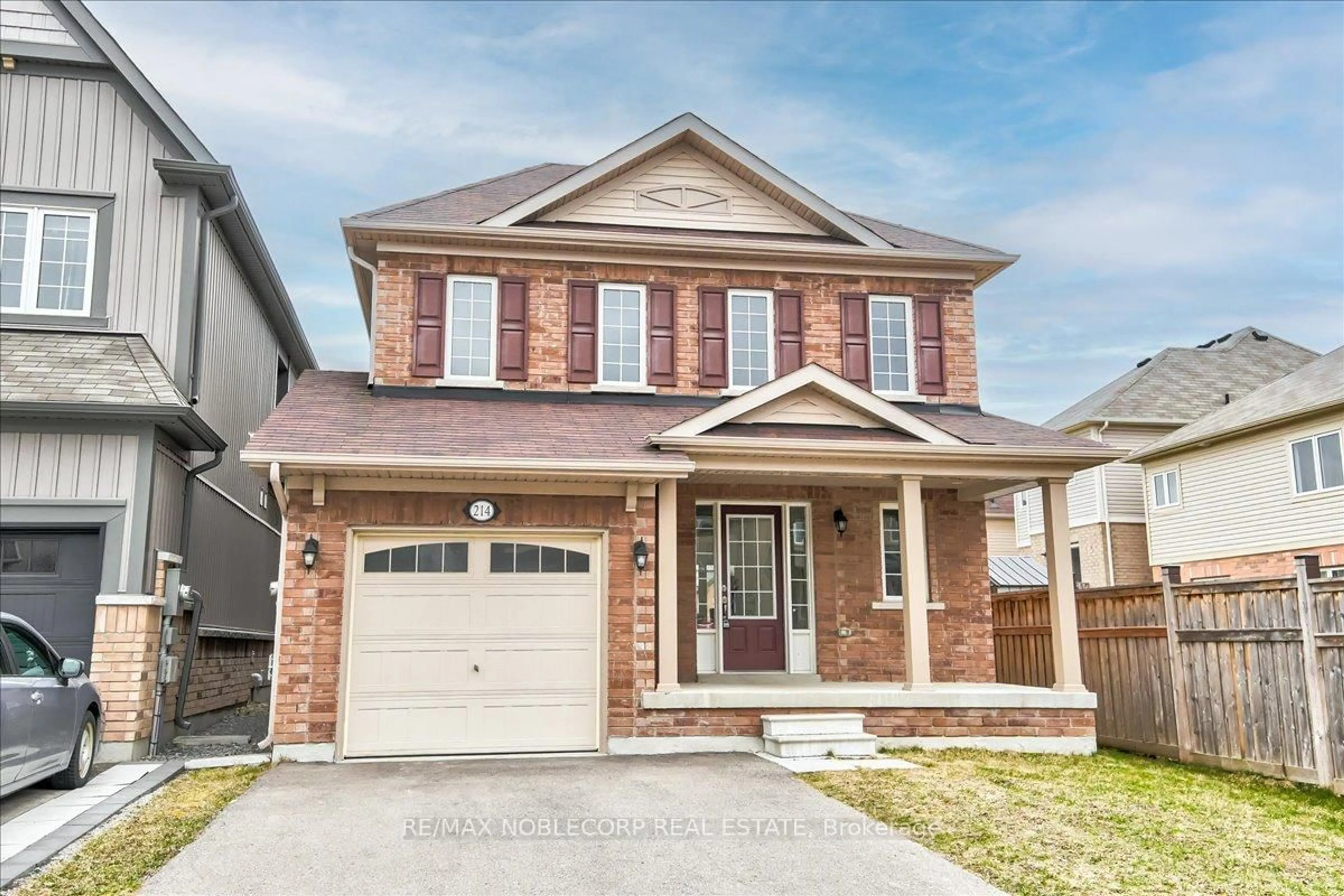 Home with brick exterior material, street for 214 Bruce Cameron Dr, Clarington Ontario L1C 0W3