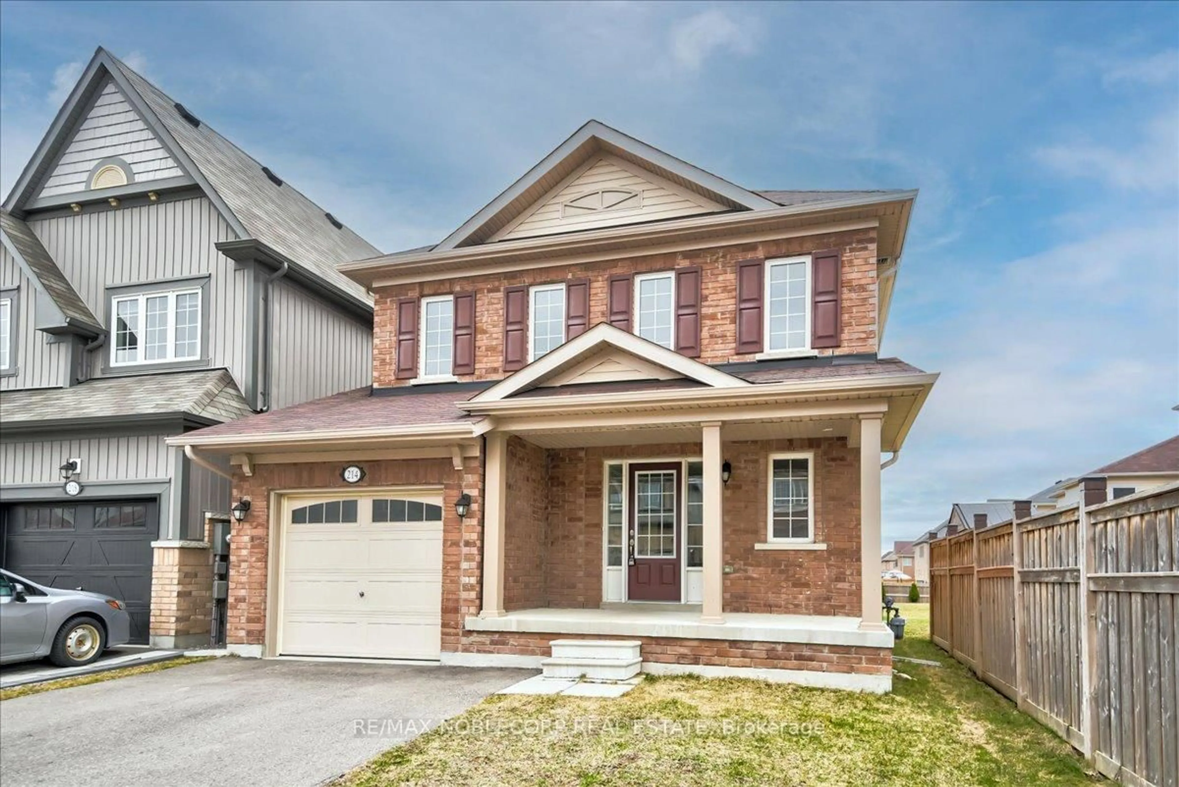 Home with brick exterior material, street for 214 Bruce Cameron Dr, Clarington Ontario L1C 0W3