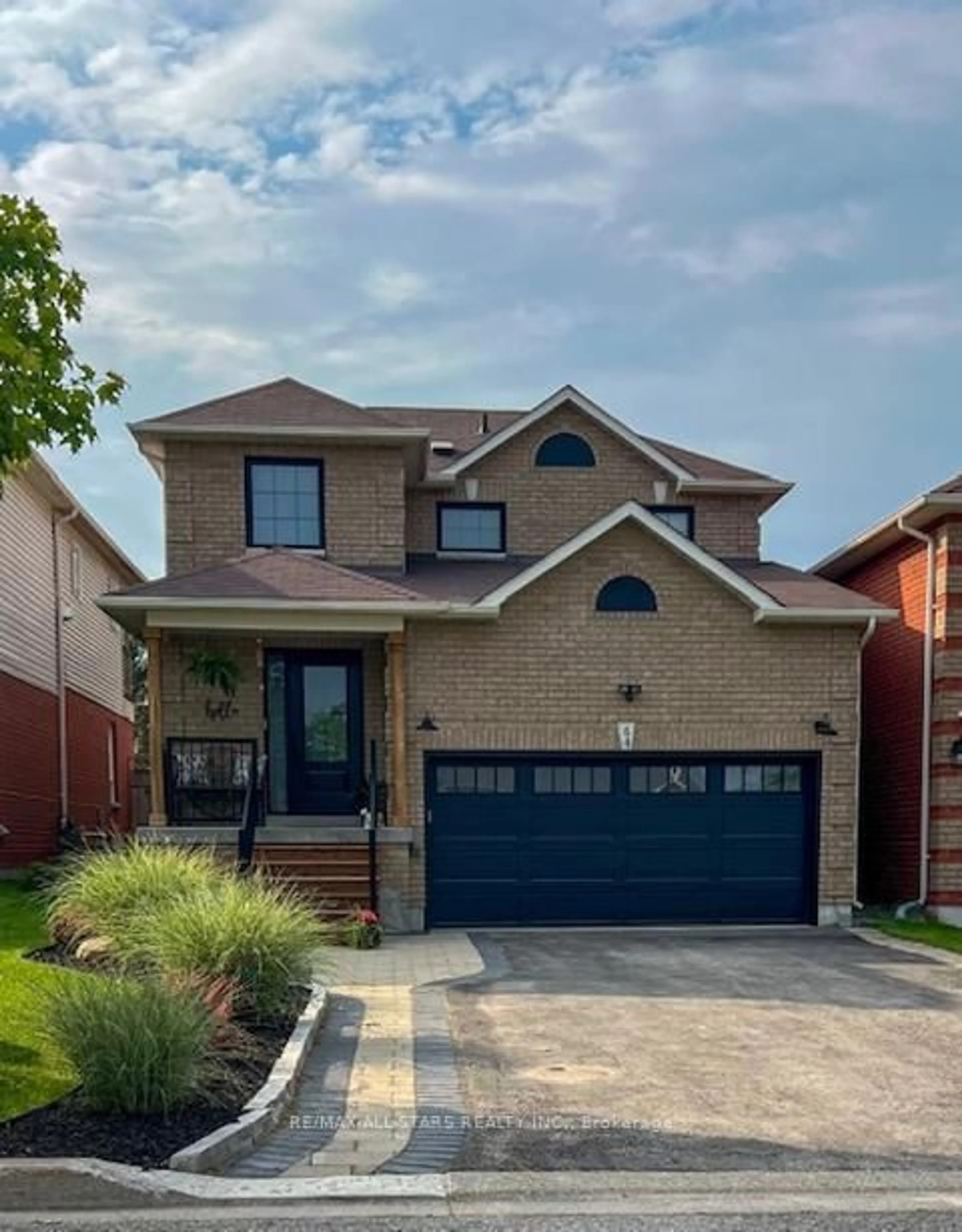 Home with brick exterior material, street for 64 Brandon Rd, Scugog Ontario L9L 1S8
