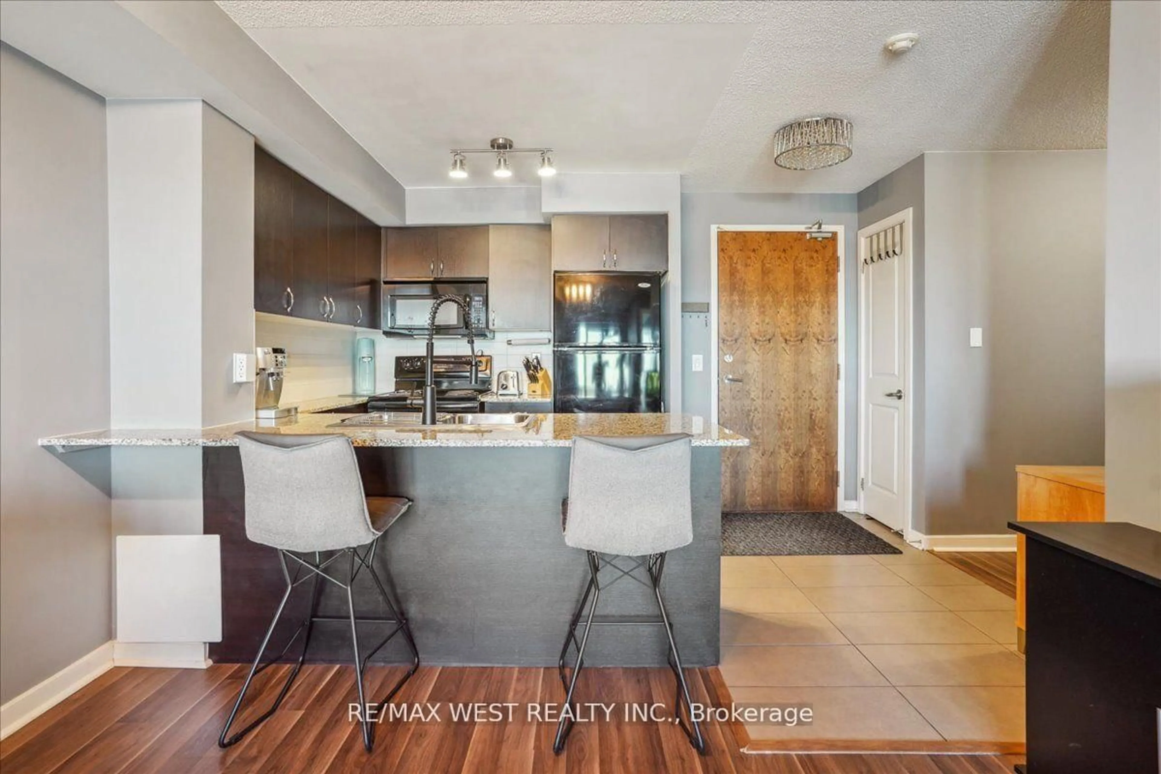 Open concept kitchen, wood/laminate floor for 1235 Bayly St #1105, Pickering Ontario L1W 1L7