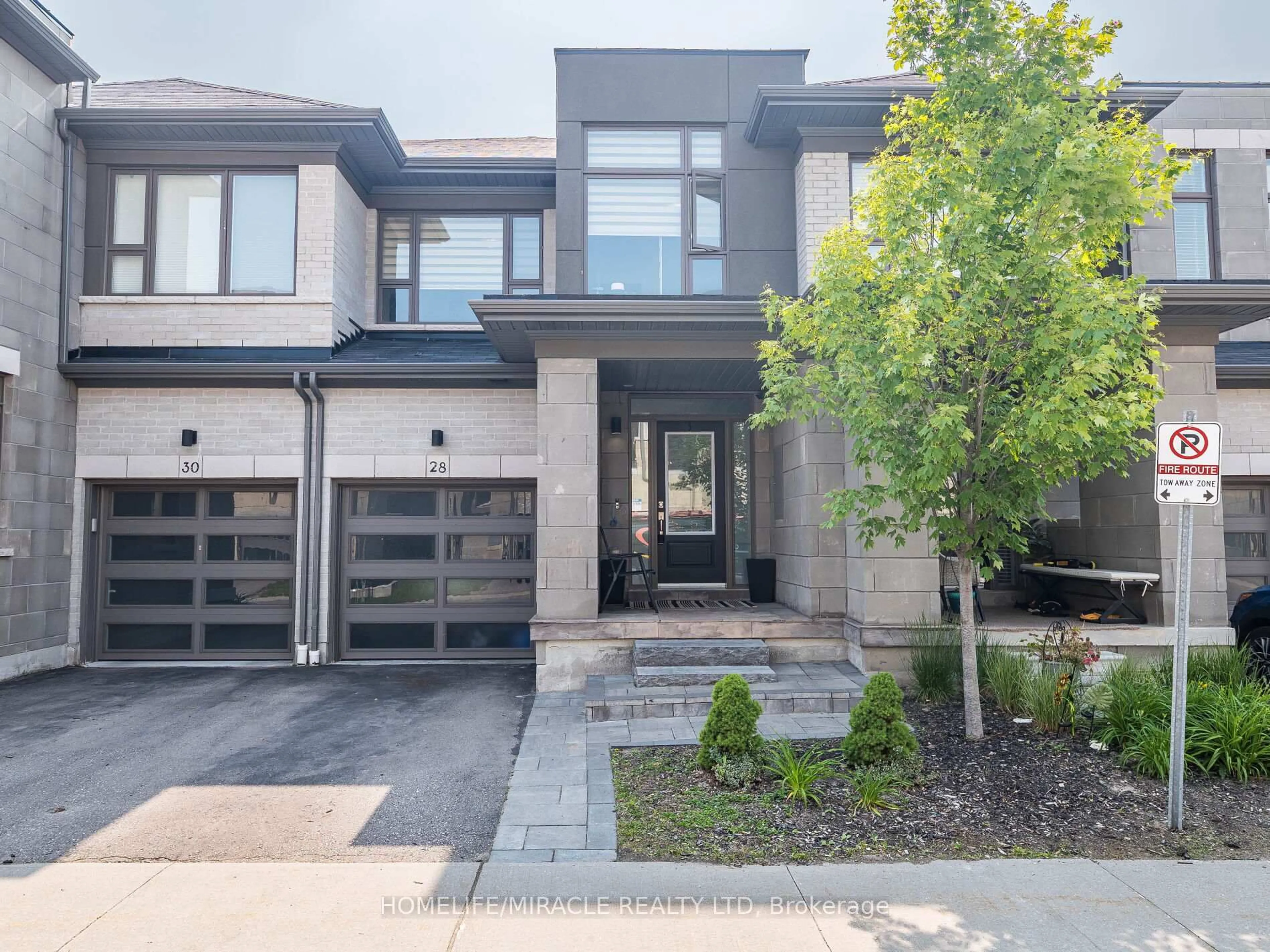 Home with brick exterior material, street for 28 Donald Fleming Way, Whitby Ontario L1R 0N8