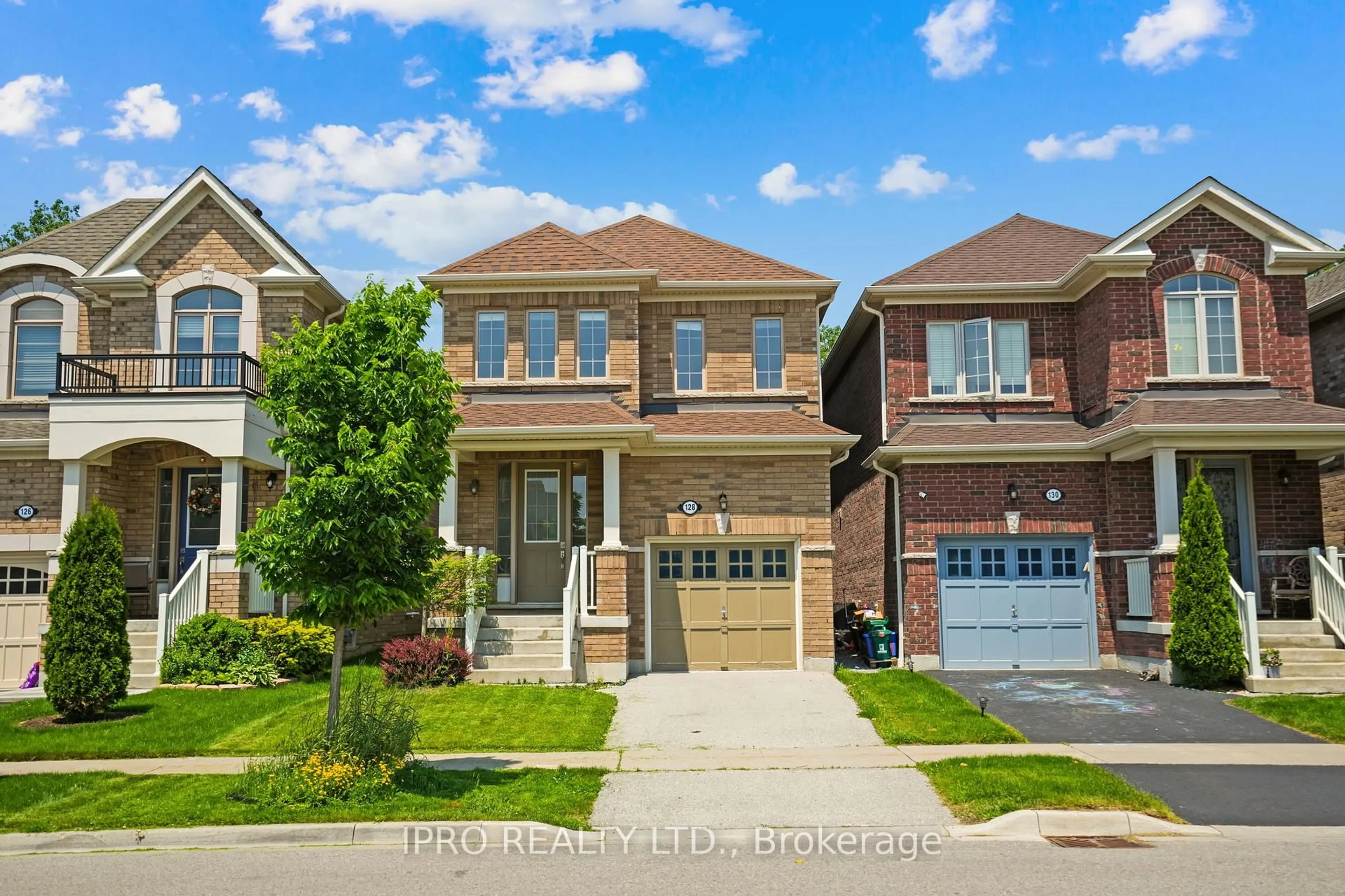 Home with brick exterior material, street for 128 Bridlewood Blvd, Whitby Ontario L1R 0N2