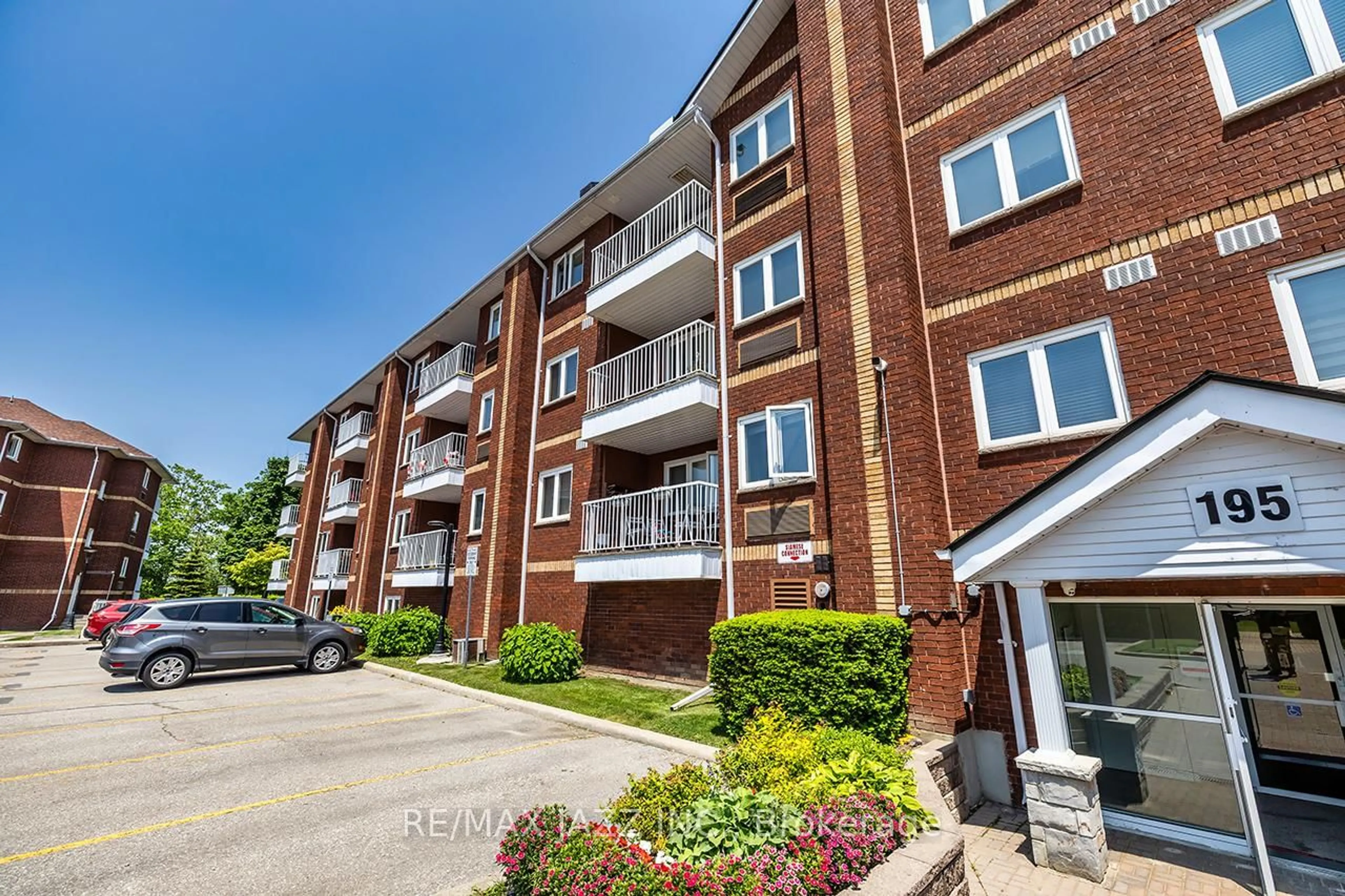 A pic from outside/outdoor area/front of a property/back of a property/a pic from drone, street for 195 Lake Driveway #411, Ajax Ontario L1S 7H7
