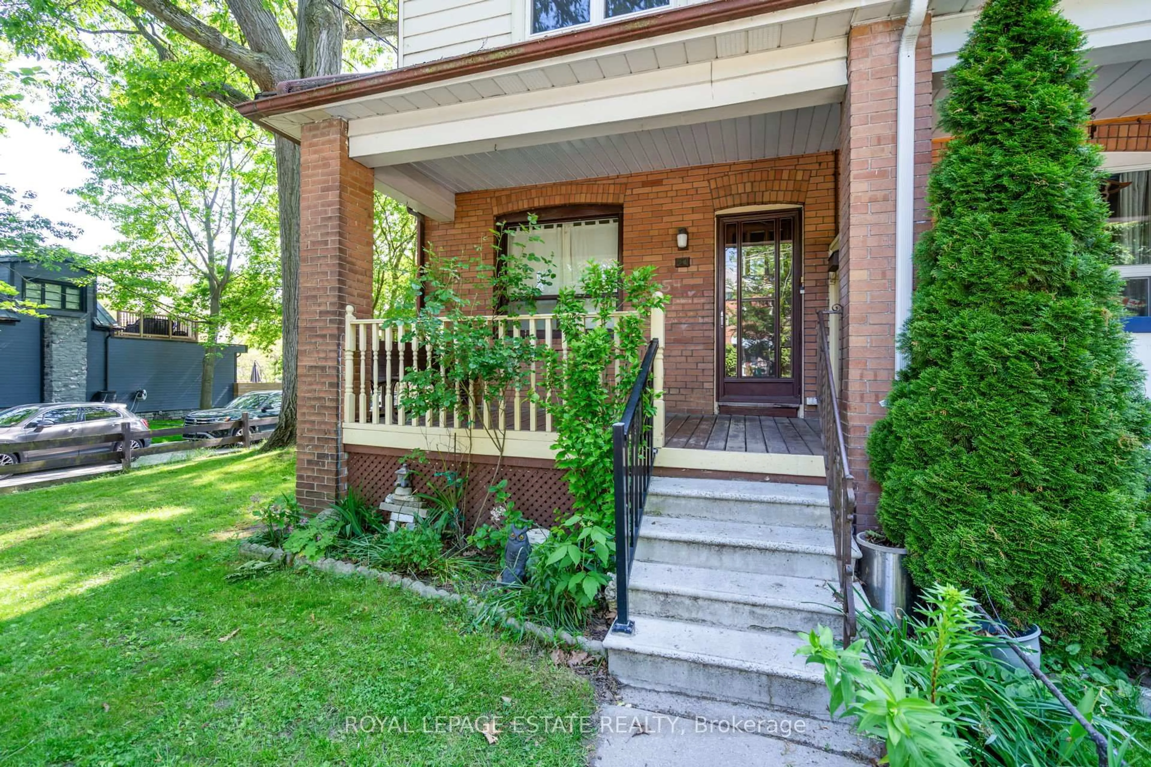 Home with brick exterior material, street for 54 Kenilworth Ave, Toronto Ontario M4L 3S5