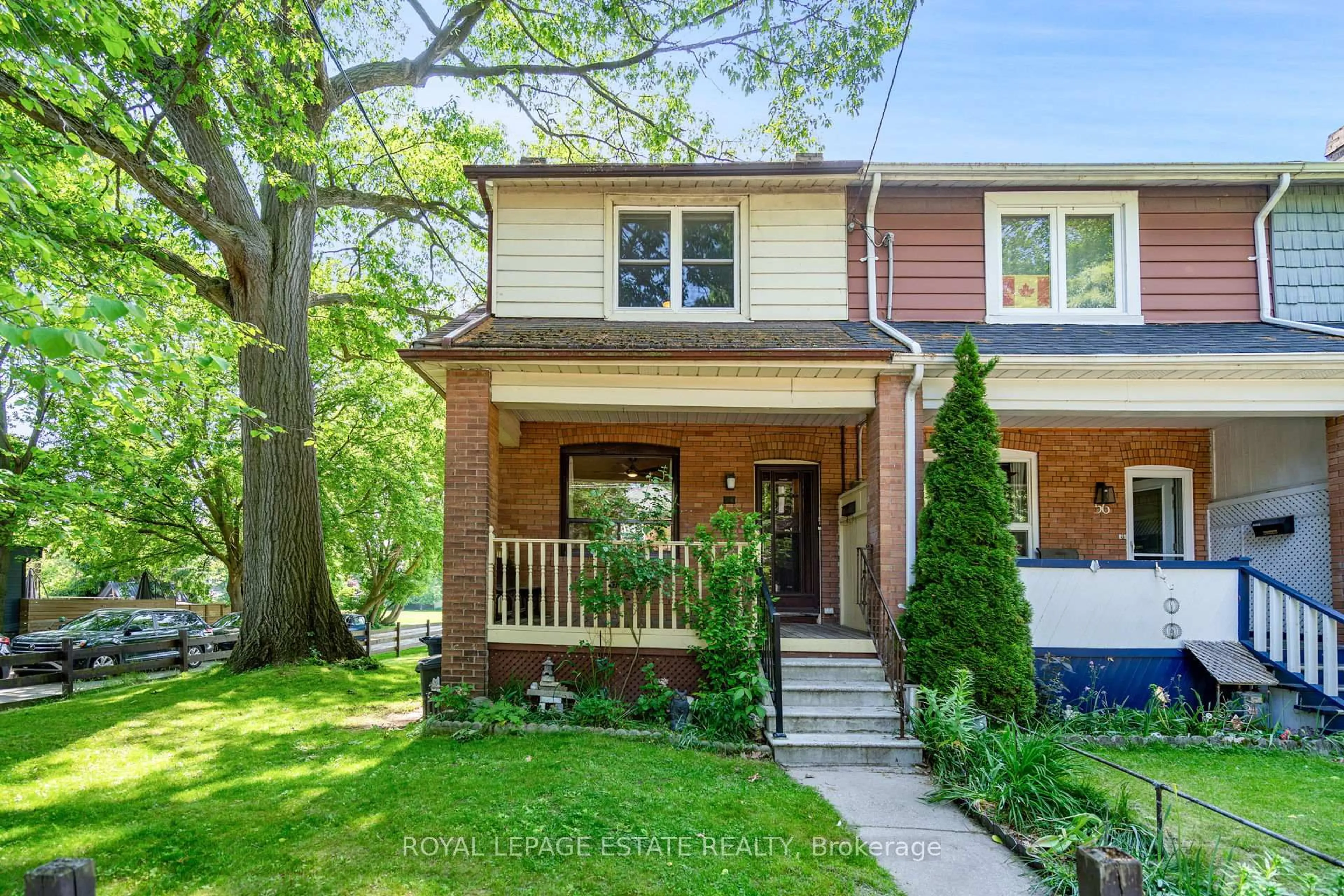 Home with brick exterior material, street for 54 Kenilworth Ave, Toronto Ontario M4L 3S5