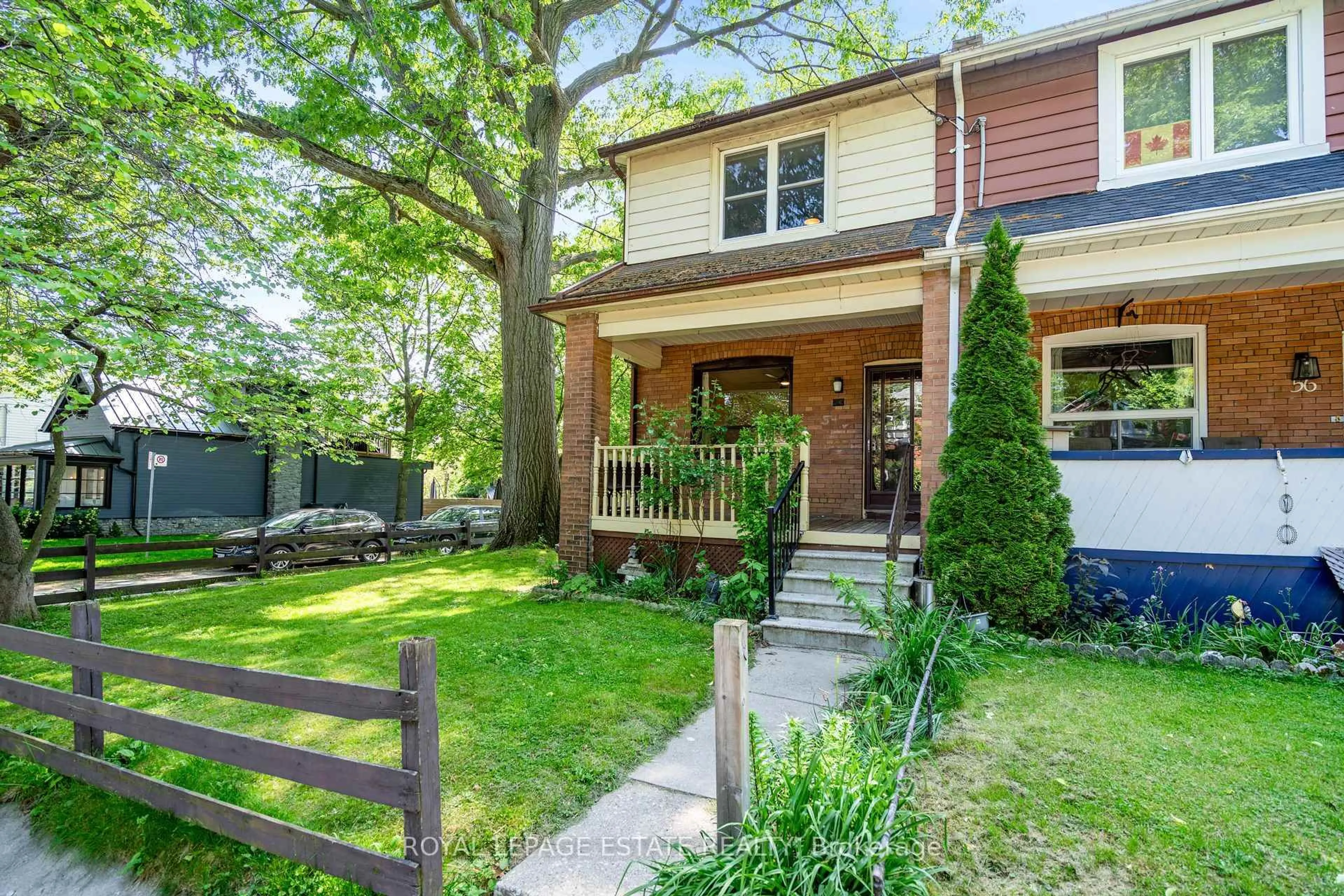 Home with brick exterior material, street for 54 Kenilworth Ave, Toronto Ontario M4L 3S5