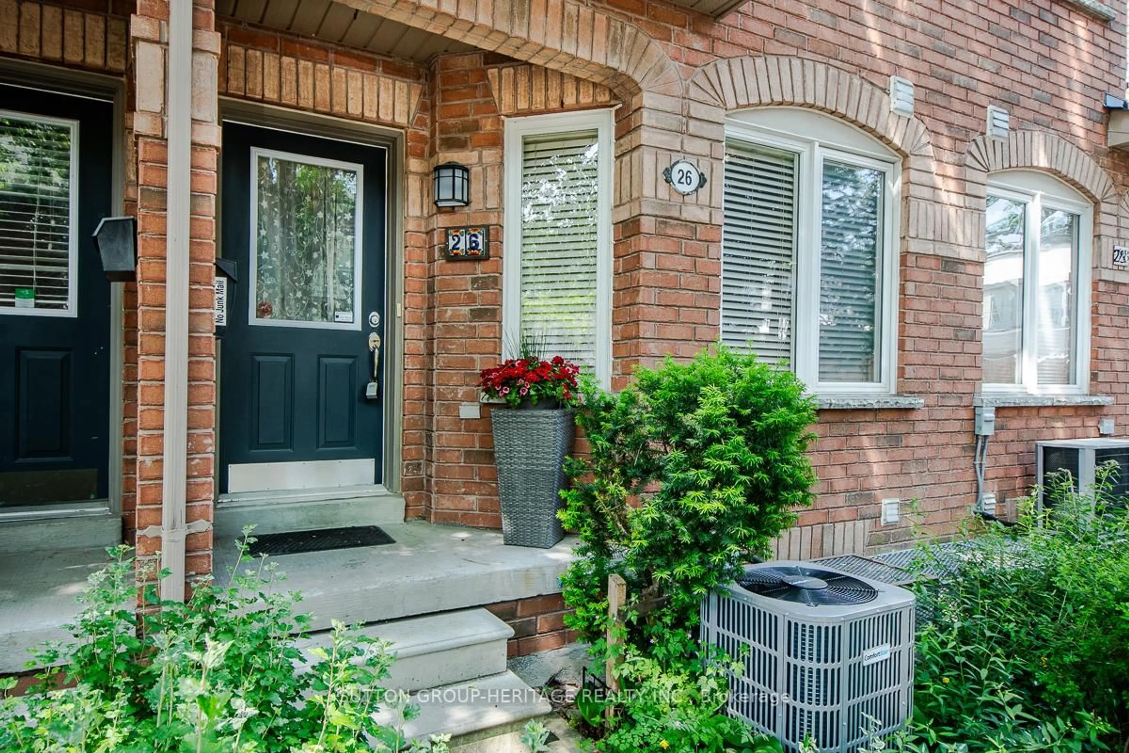 Home with brick exterior material, street for 26 Filmic Lane, Toronto Ontario M4M 3R1