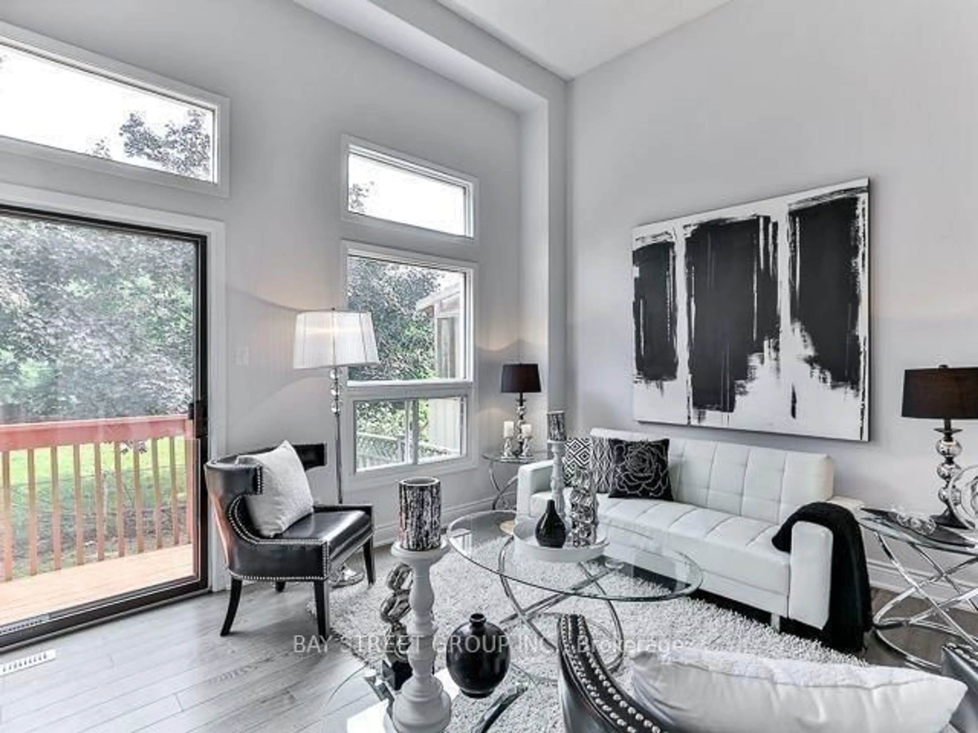 Living room with furniture, wood/laminate floor for 43 Crown Acres Crt, Toronto Ontario M1S 4W1