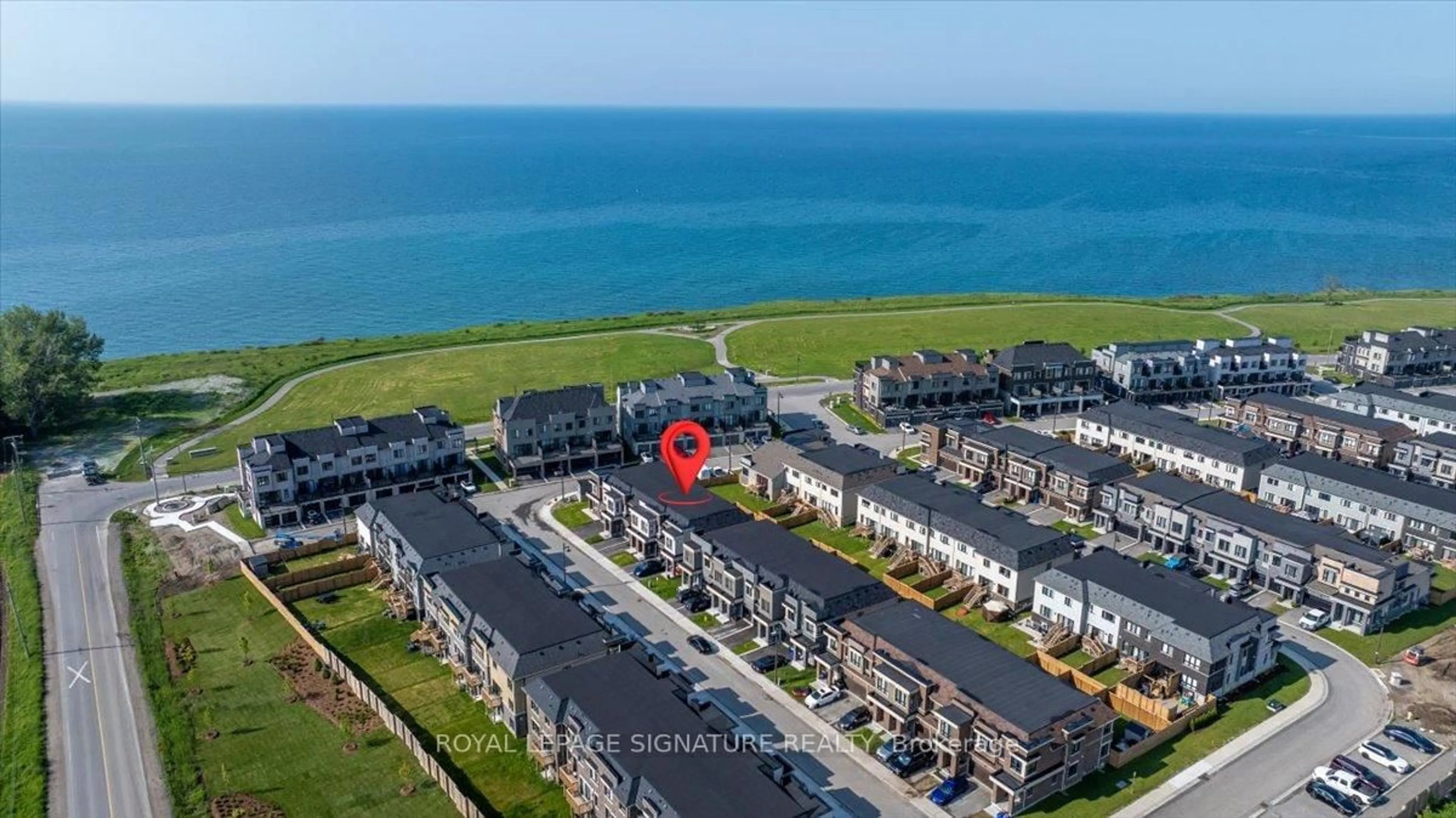 A pic from outside/outdoor area/front of a property/back of a property/a pic from drone, water/lake/river/ocean view for 145 Sailors Landing, Clarington Ontario L1C 3K5
