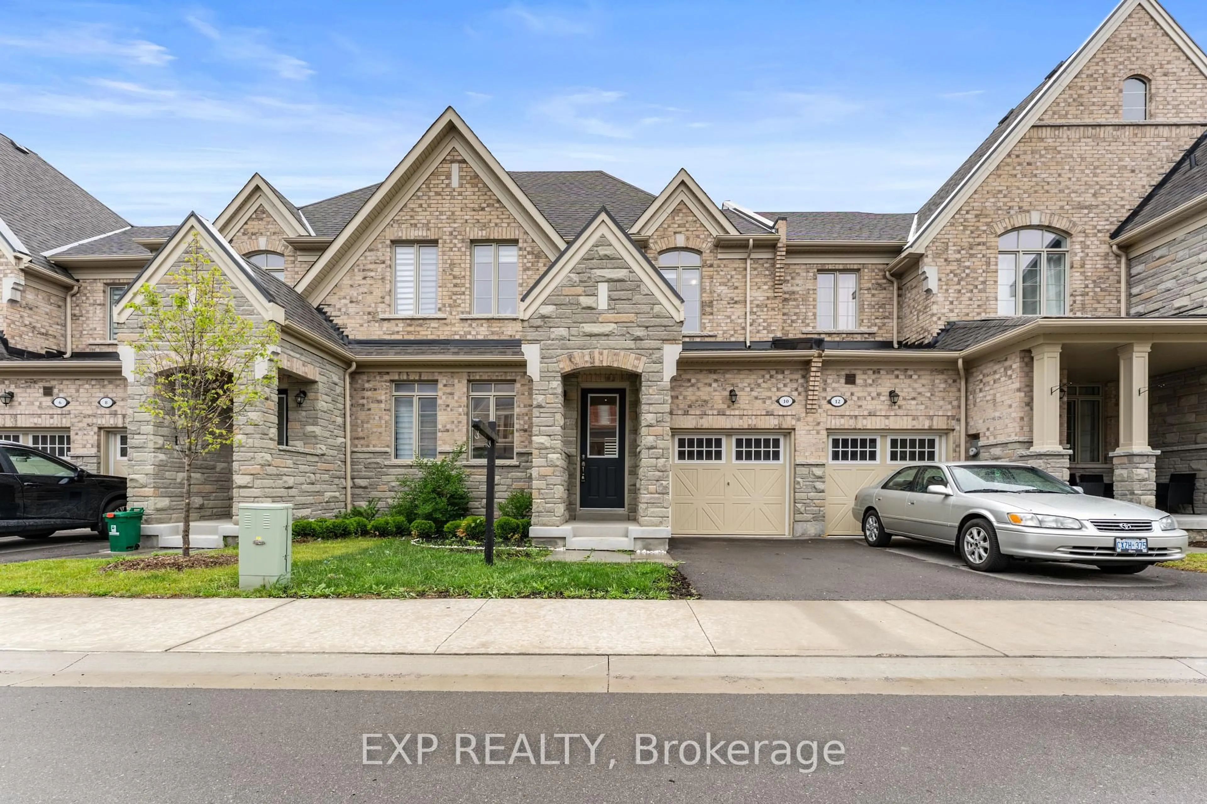 Home with brick exterior material, street for 10 Hickling Lane, Ajax Ontario L1T 0P9
